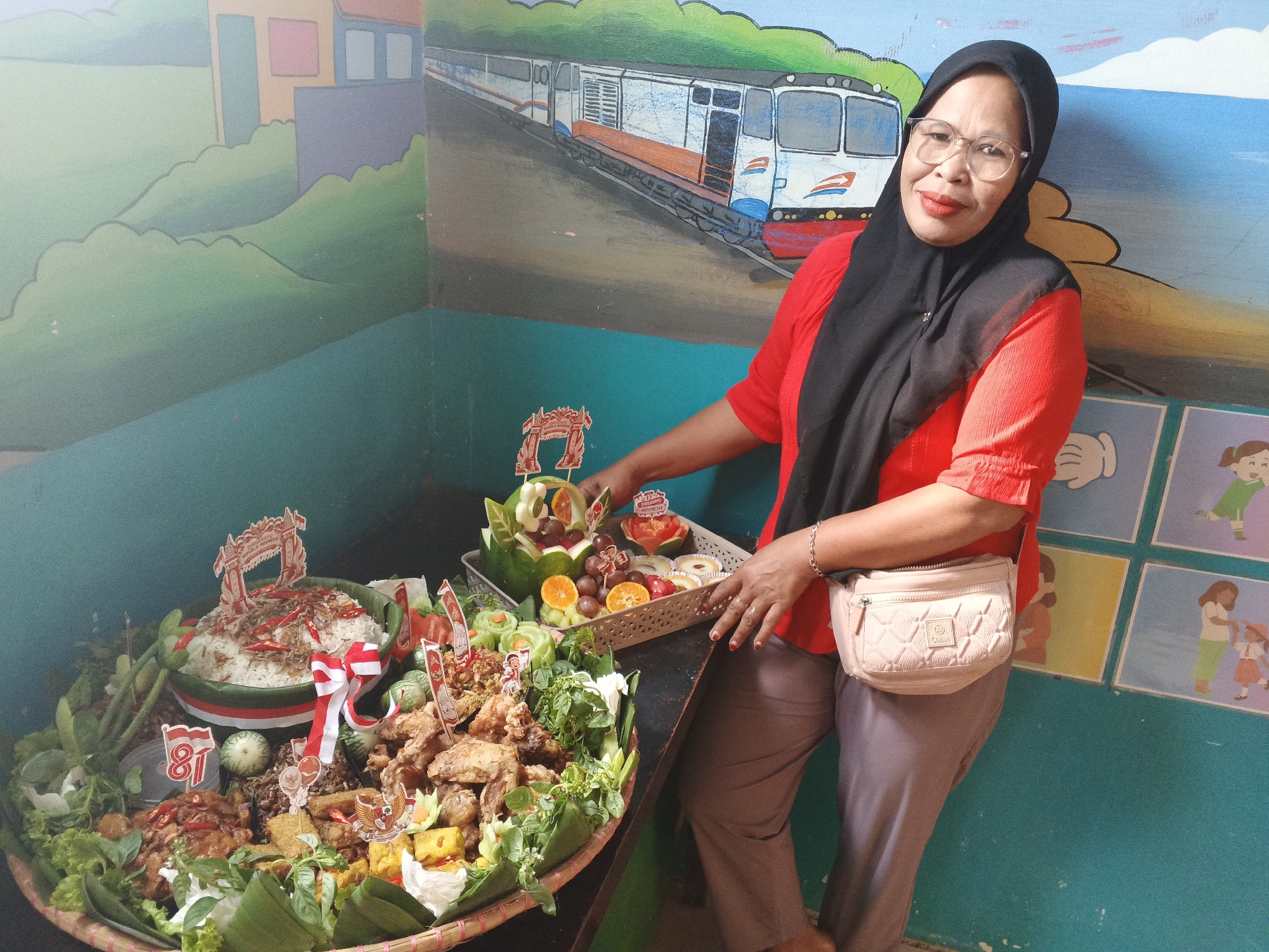 School celebration in Warungkiara with festive food and kids