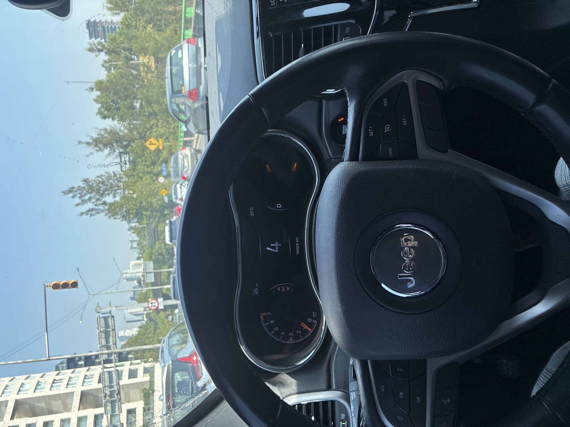 Jeep traveling slowly through Mexico City streets