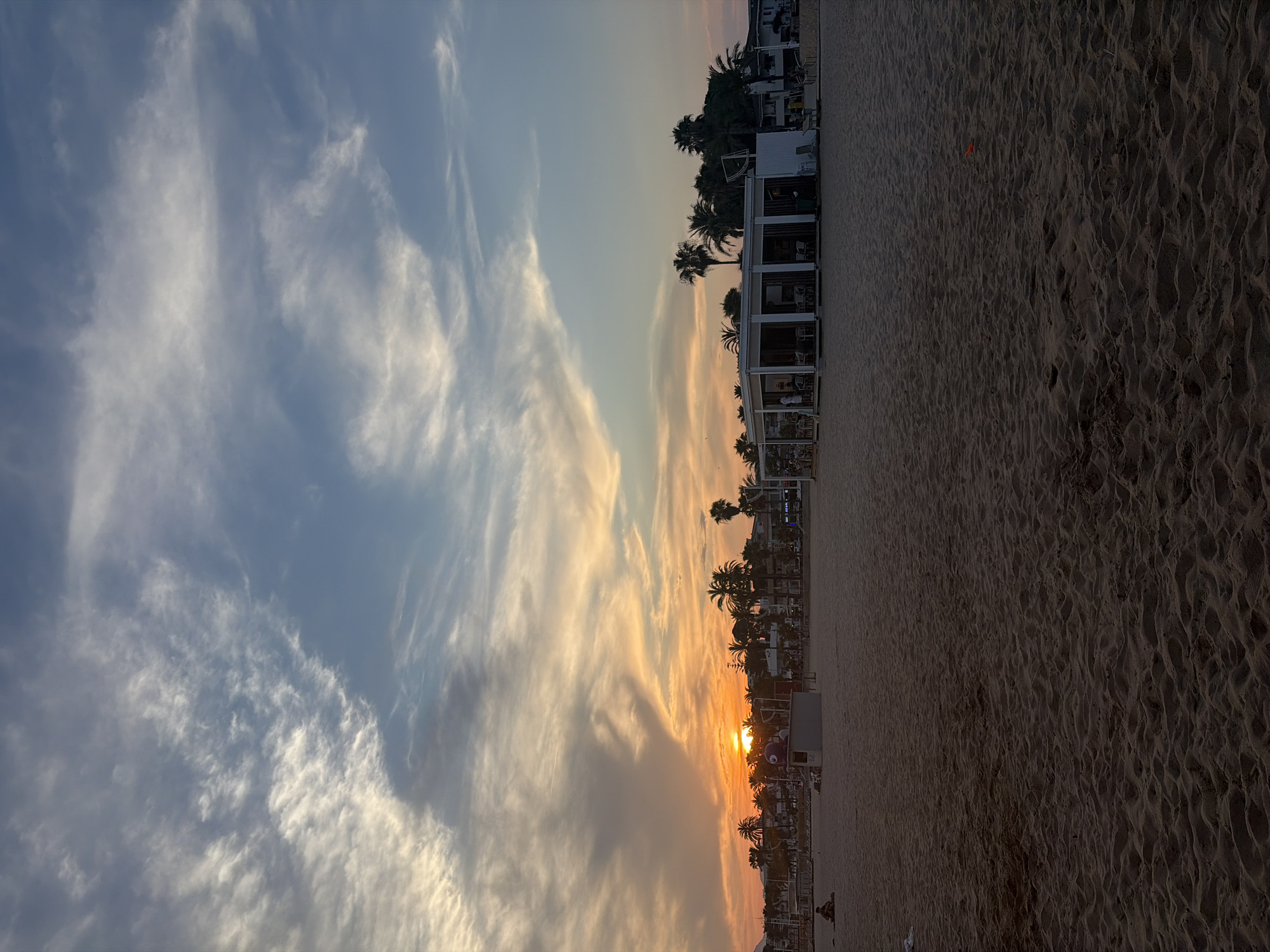 Sunset yoga circle on the beach in Cambrils