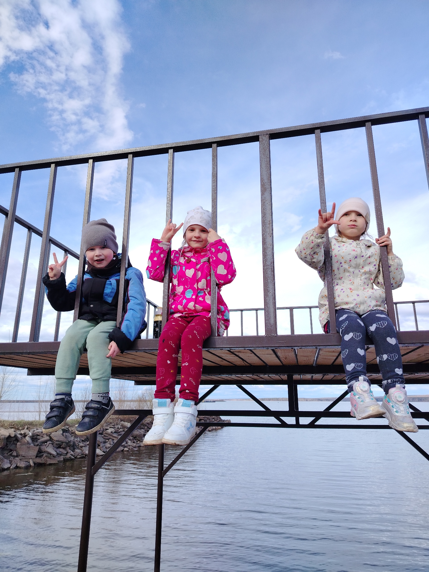 Families gather for waterfront barbecue in Chaikovsky, Russia