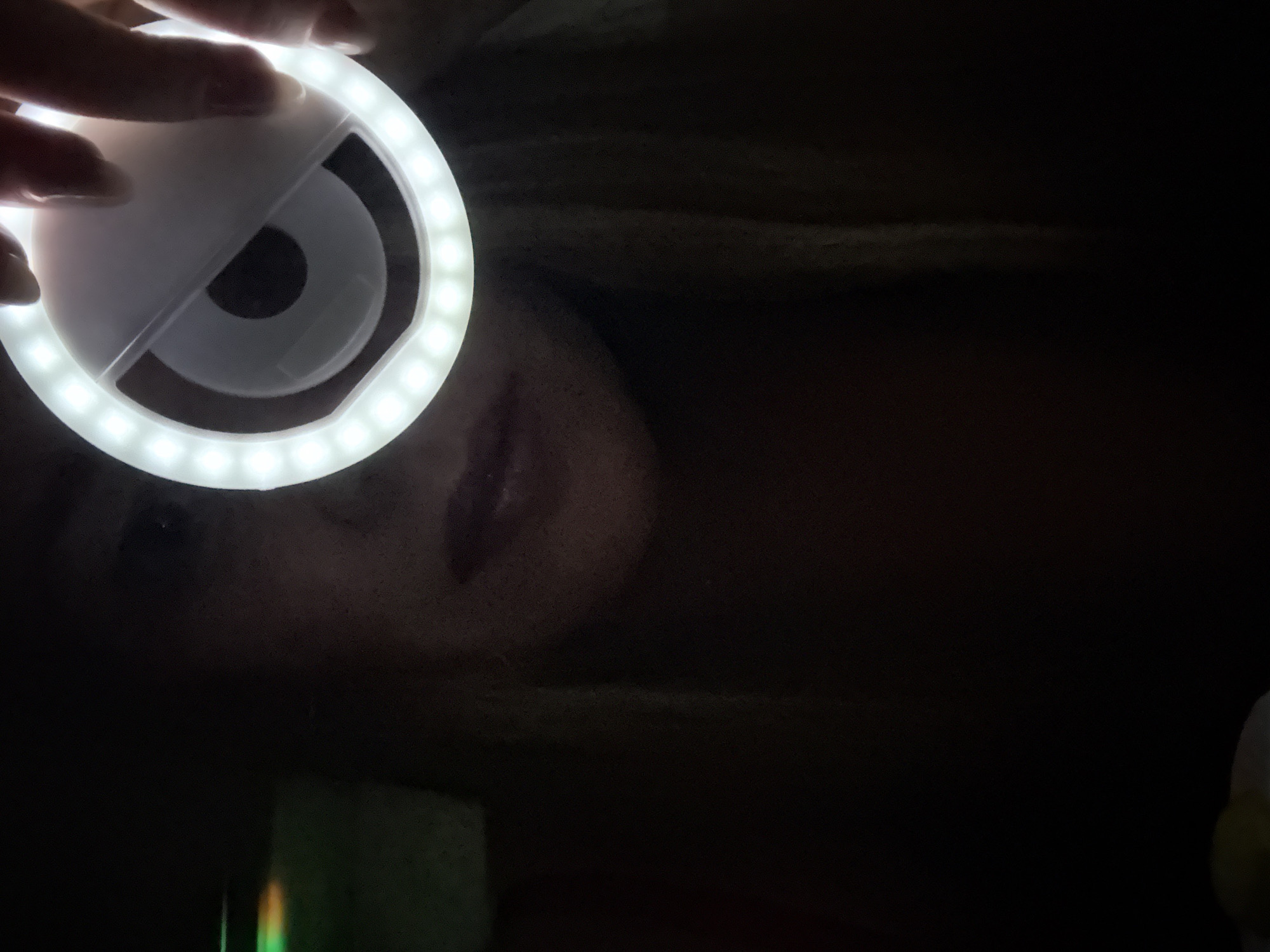 Person uses LED ring light in Chaikovsky, Russia