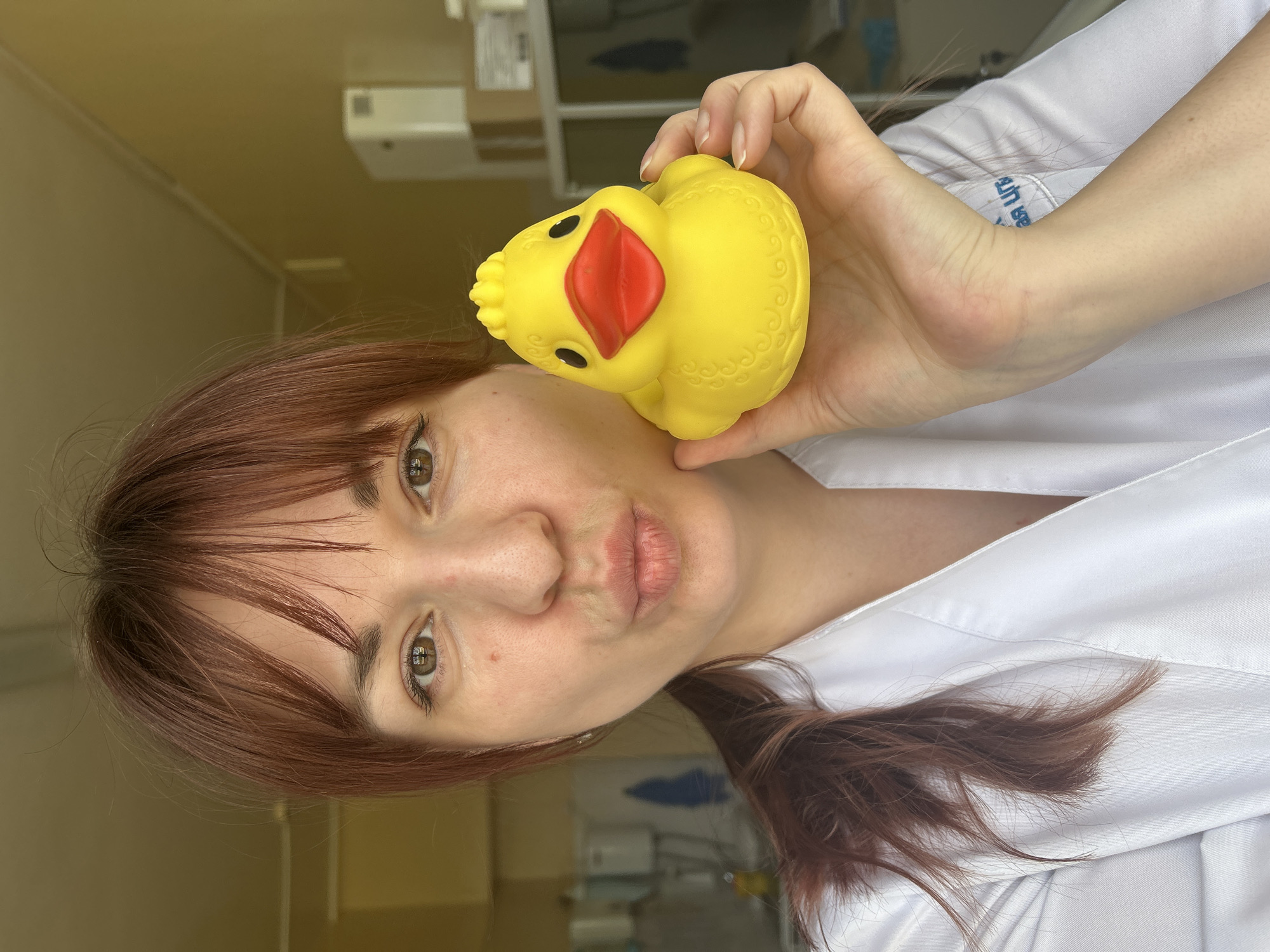 Healthcare worker takes playful selfies during early morning shift