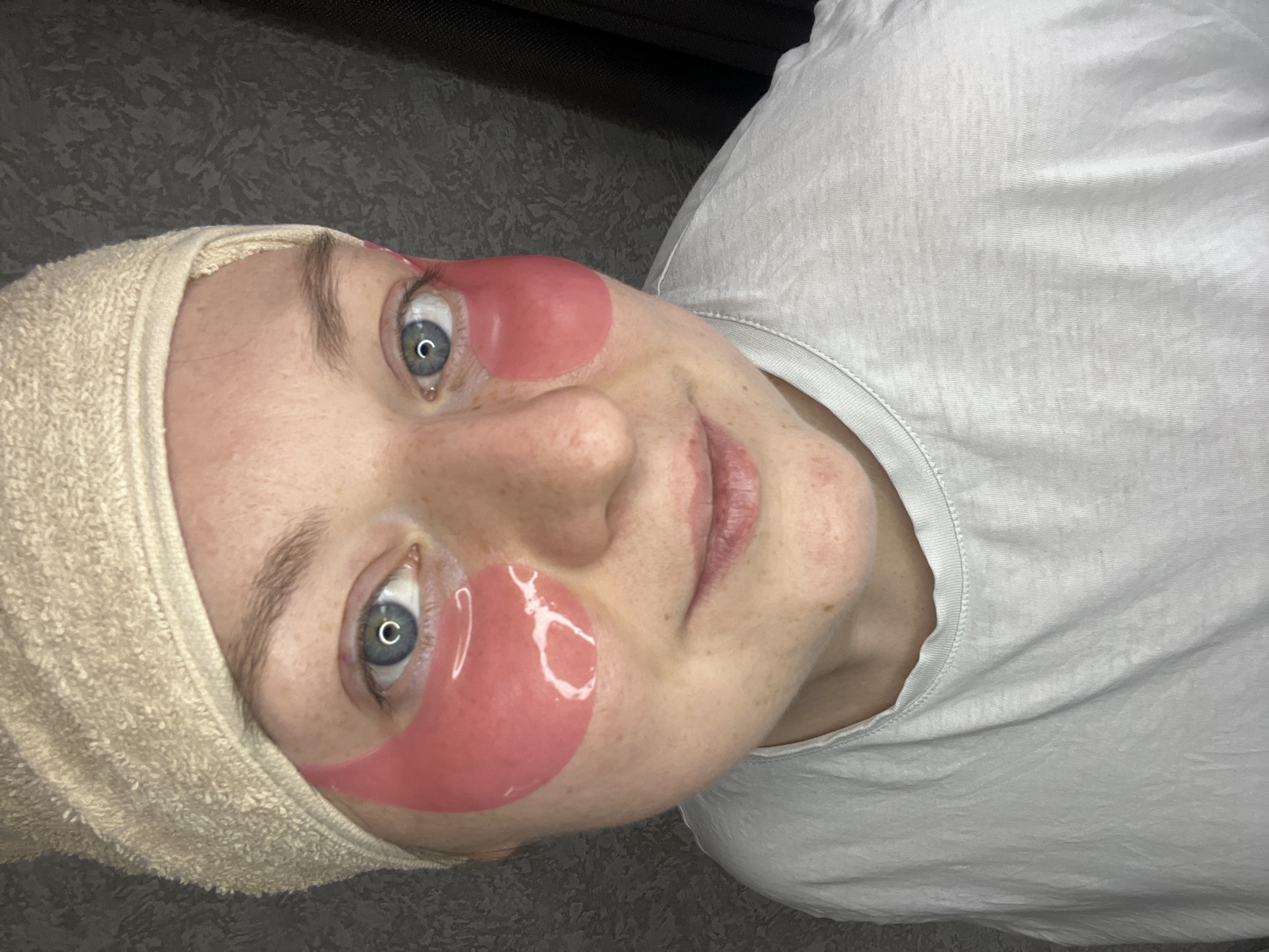 Woman receives beauty treatment with eye patches in Russia