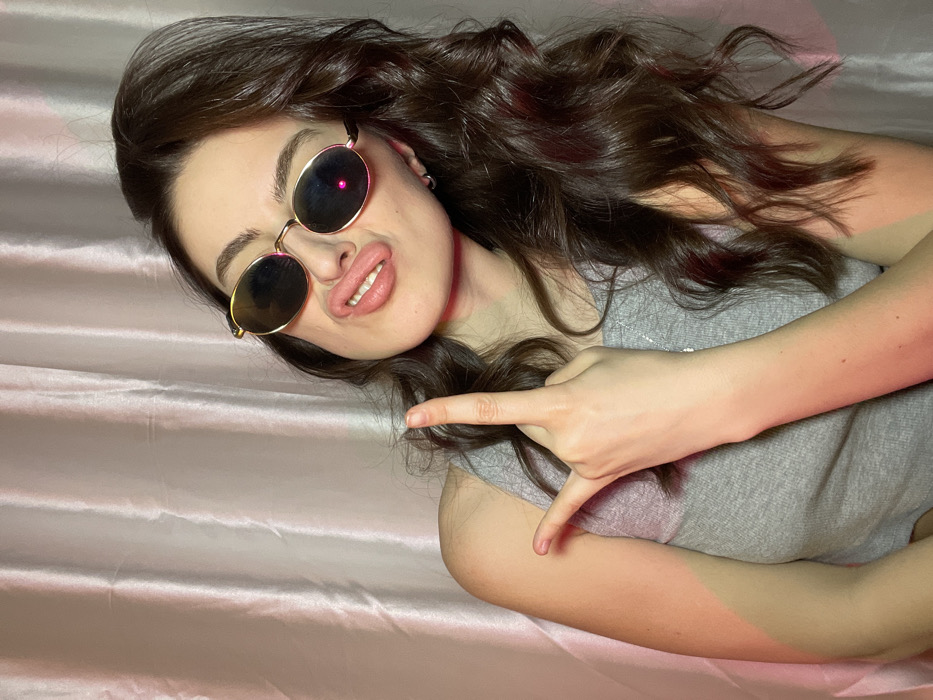 Woman conducts personal photo session in Moscow apartment