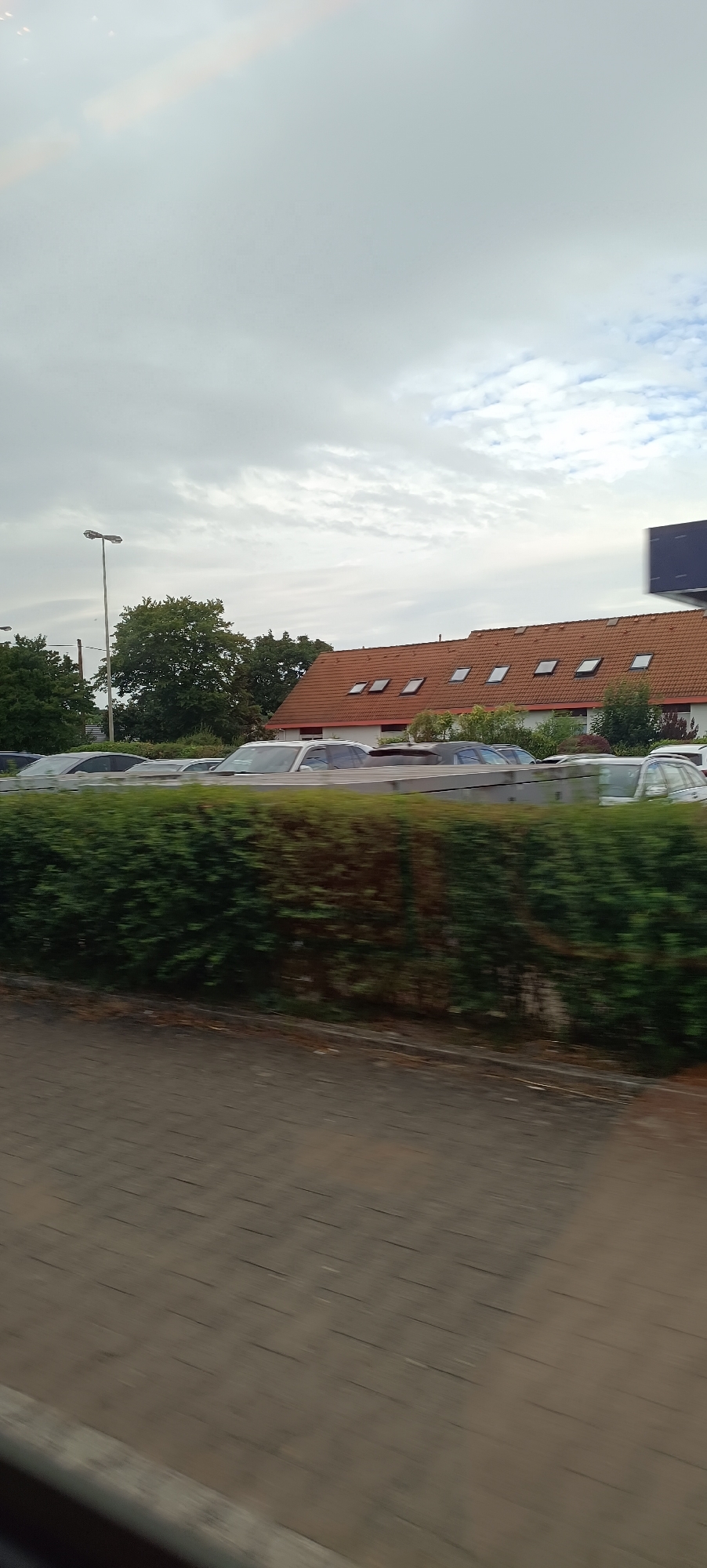 Train journey through Stuttgart's southwest suburbs, summer morning