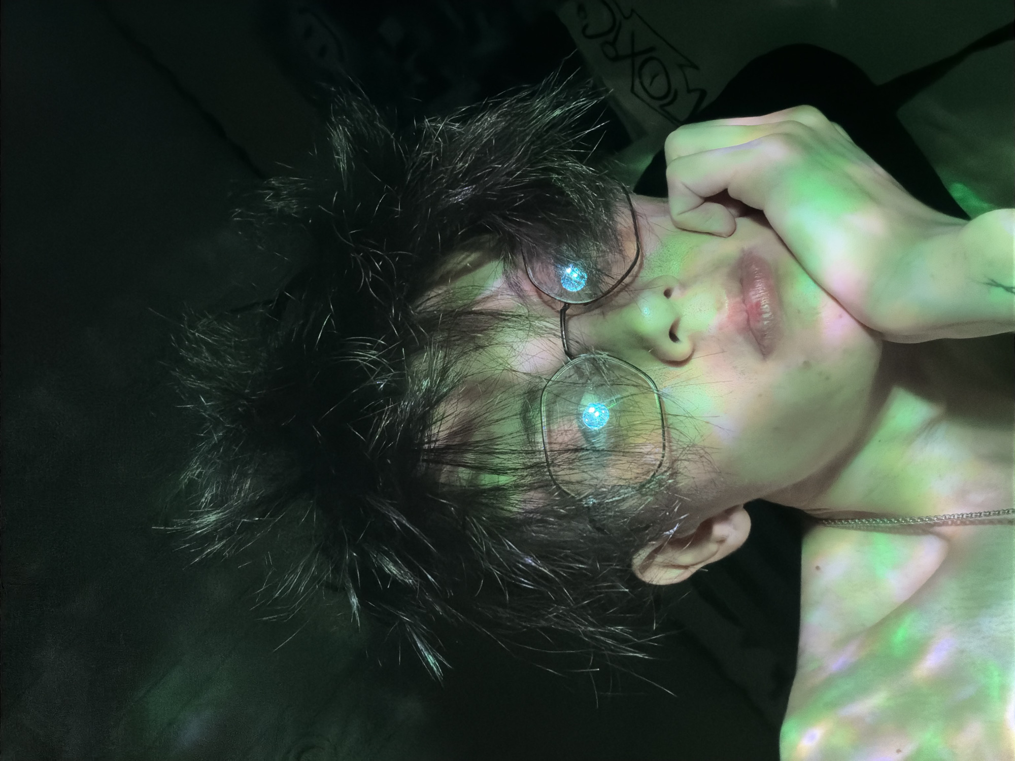 Moody colored-light self-portrait session, mixing closeups and silhouettes.