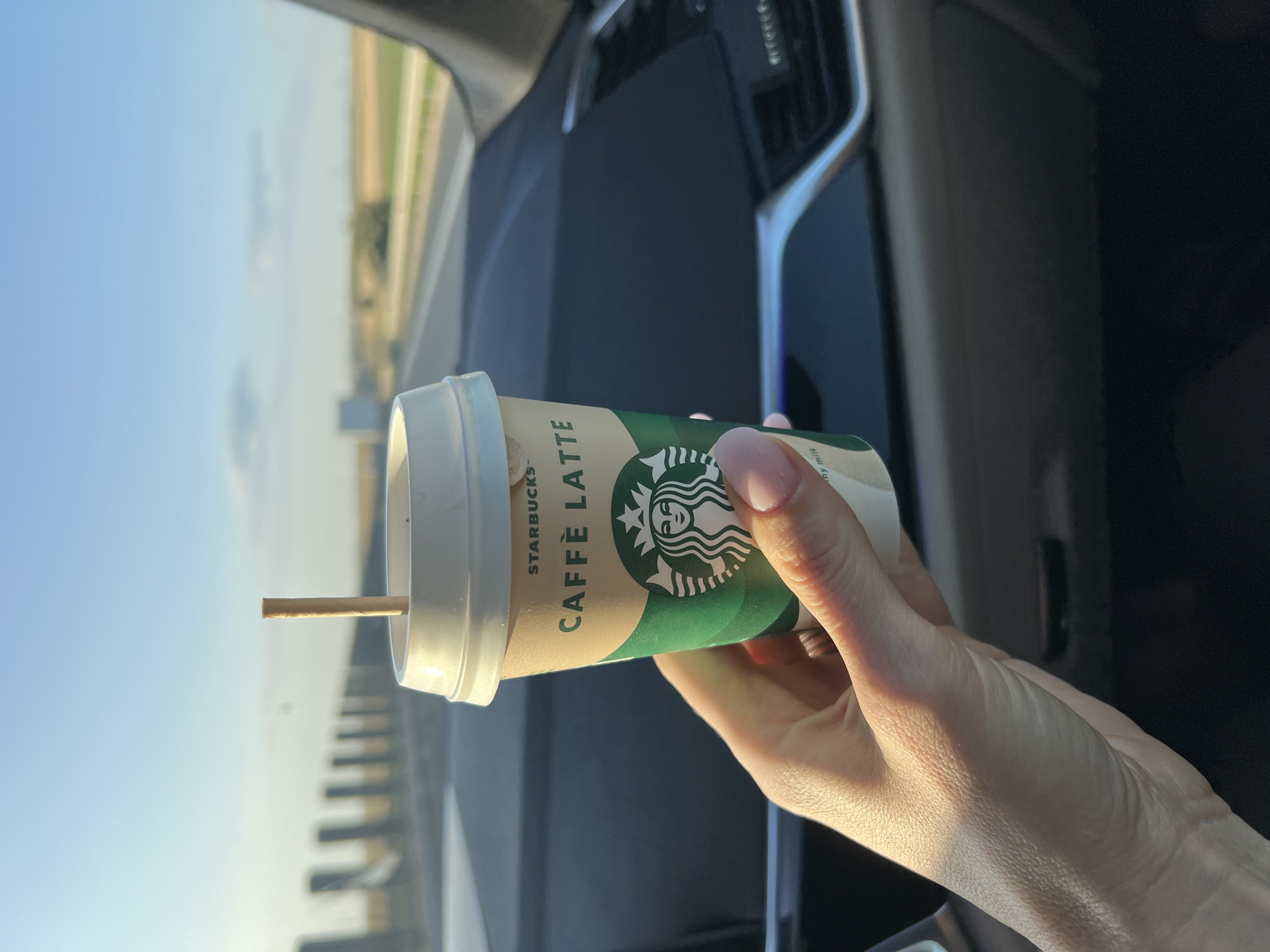 Starbucks Caffè Latte in hand, Arad, Romania