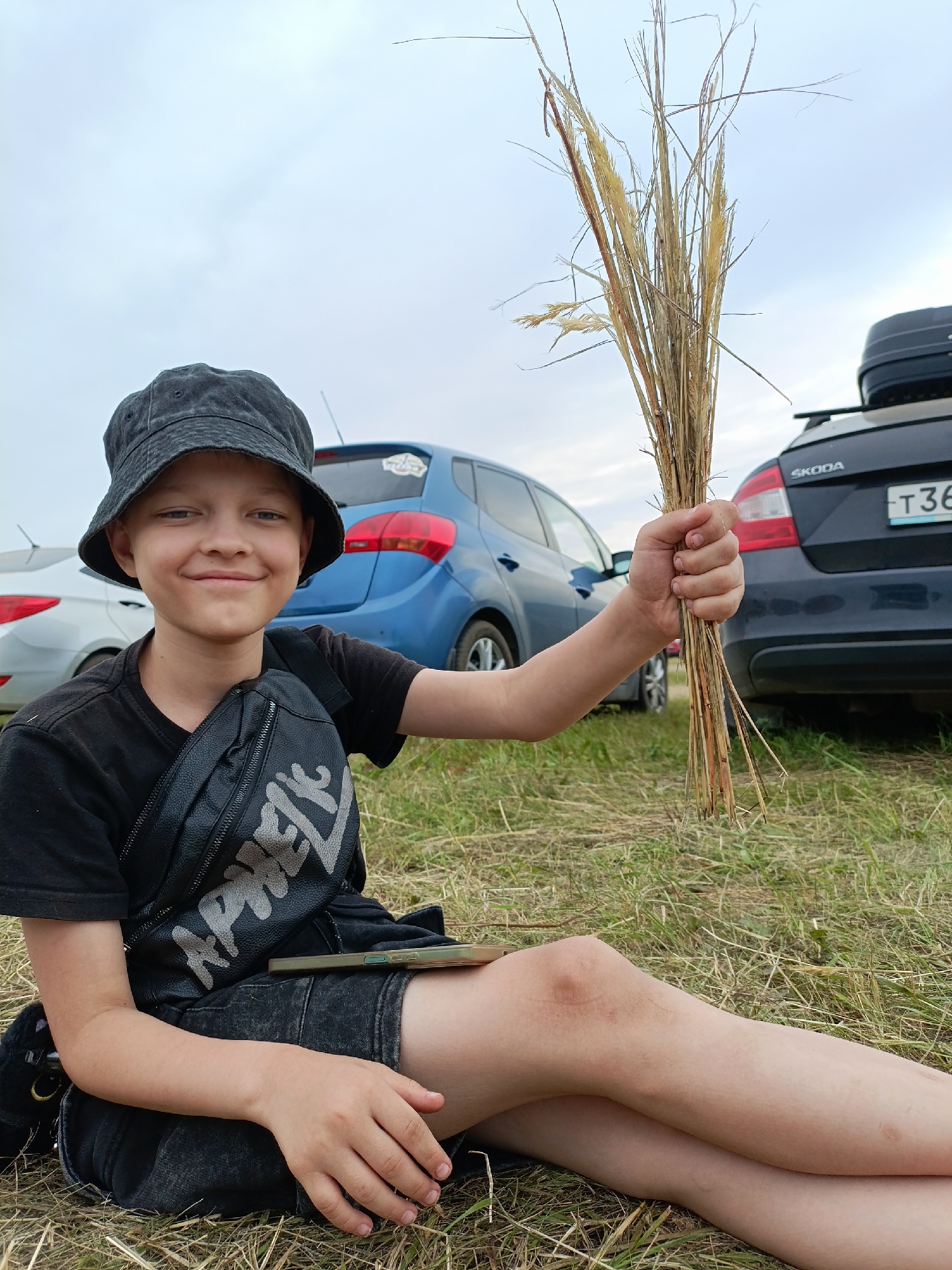 Relaxing in a grassy field in Lagunovo on a cloudy day
