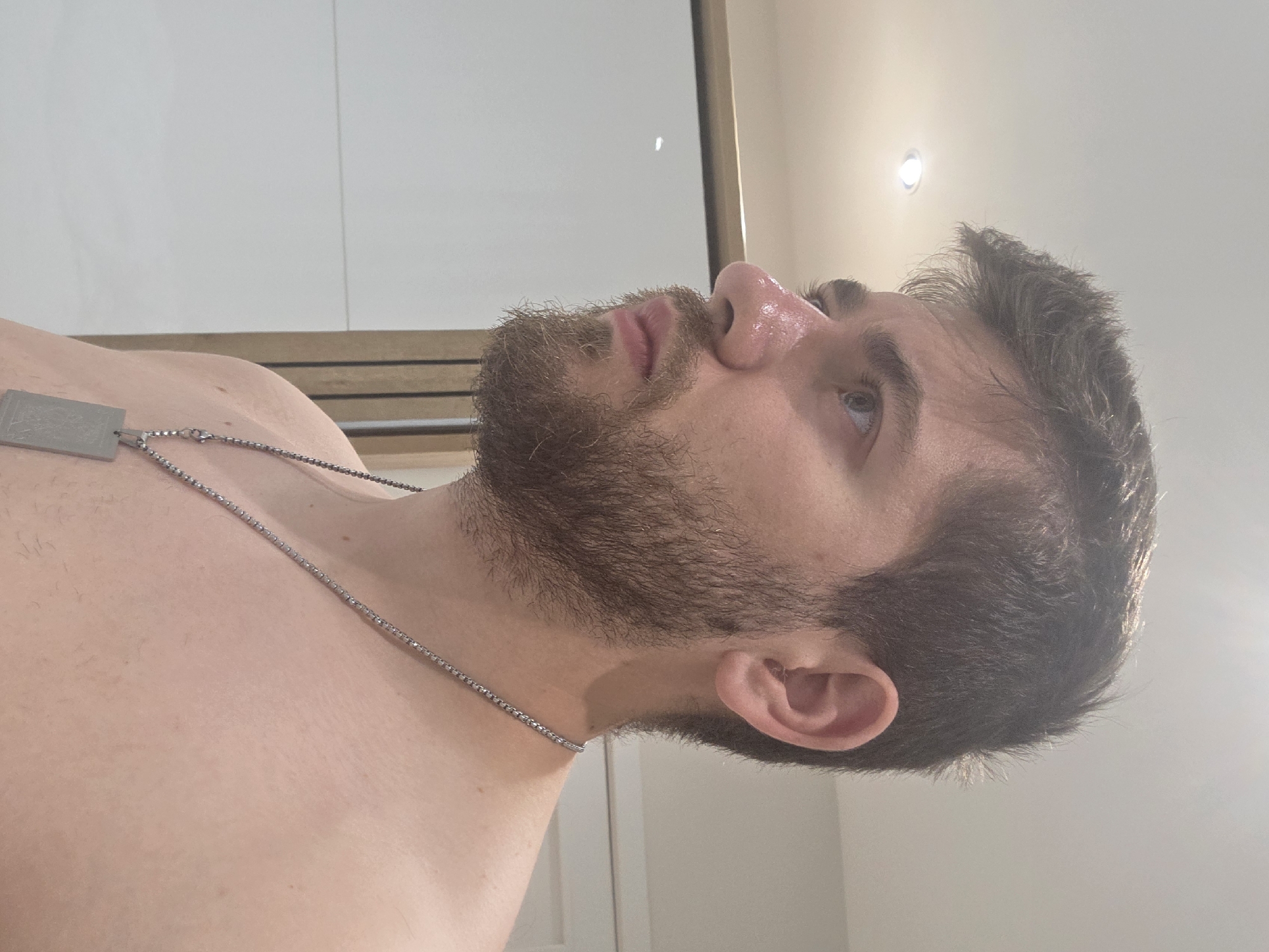 Man photographed in multiple outfits at Bulgarian residence