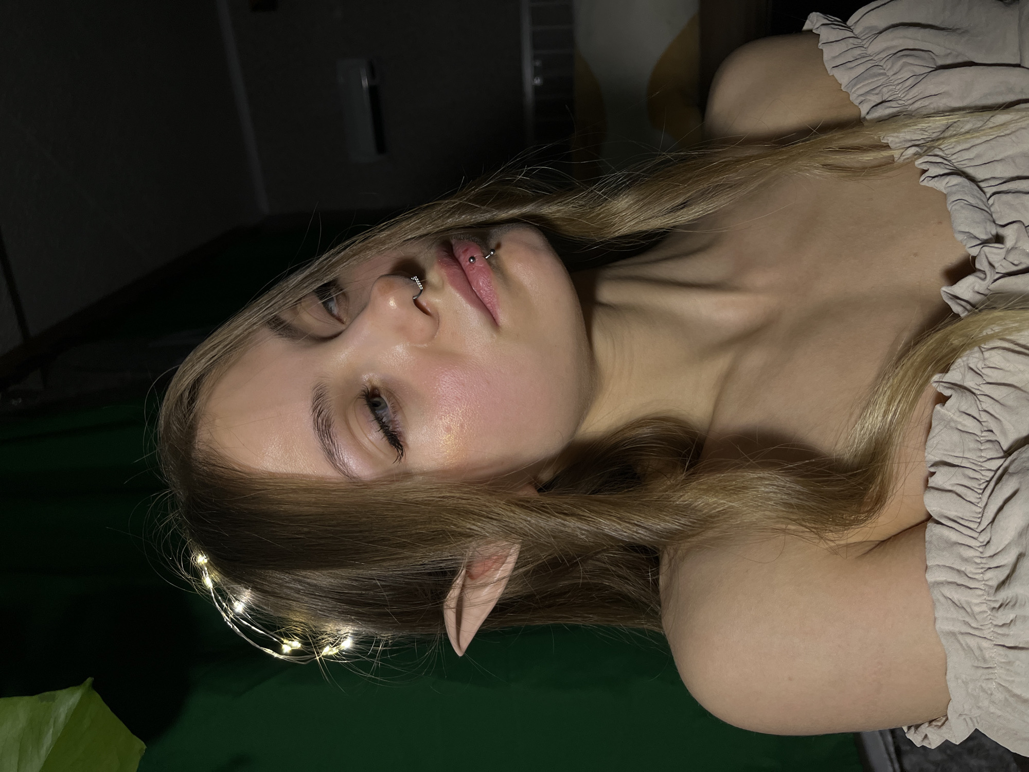 Person photographed wearing decorative LED lights in hair in Russia