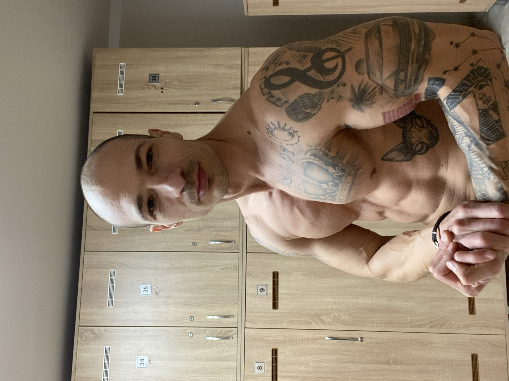 Tattooed man documented during gym session in Pleven, Bulgaria
