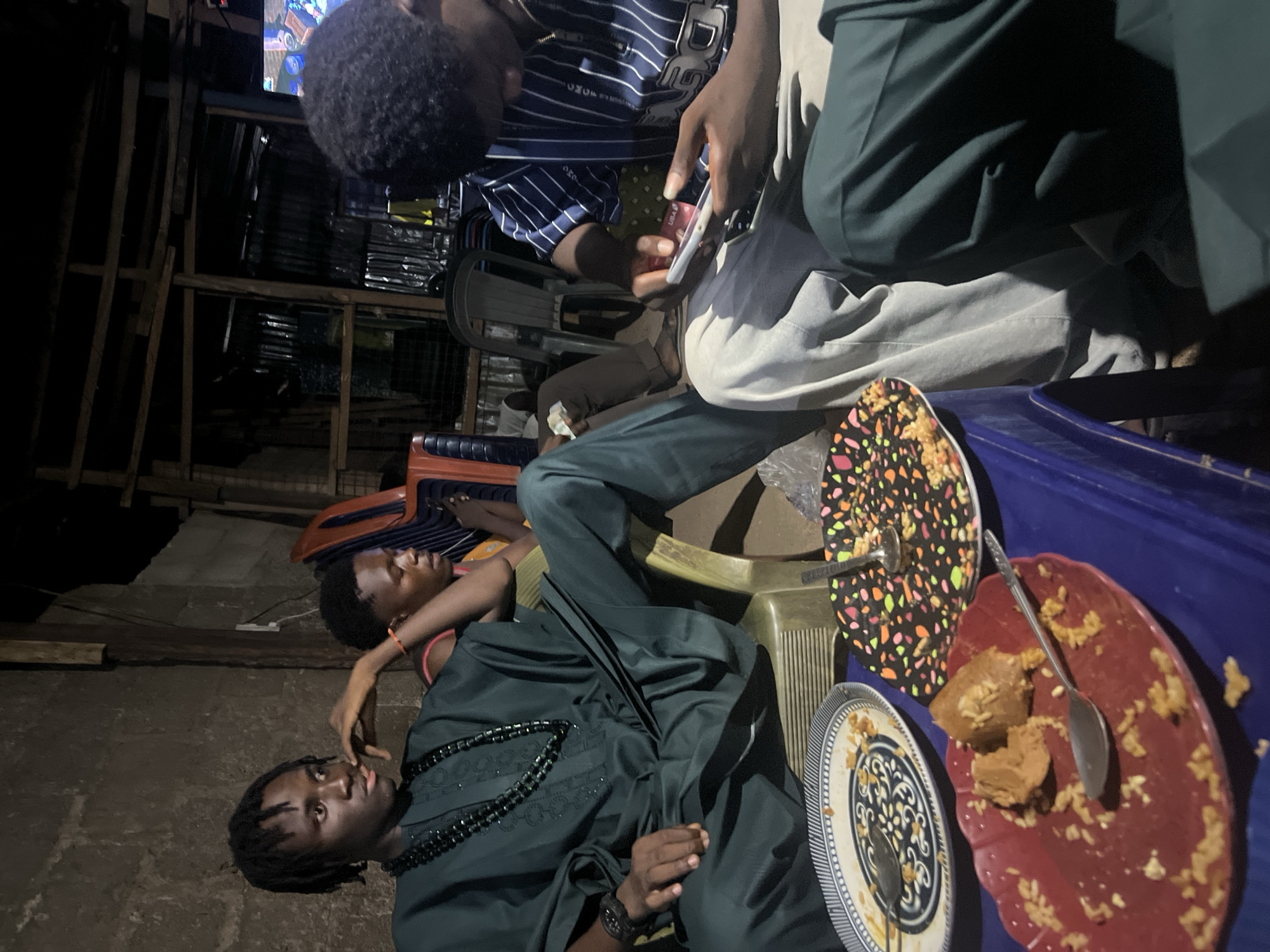 Social gathering documented in Howayi, Nigeria evening scenes