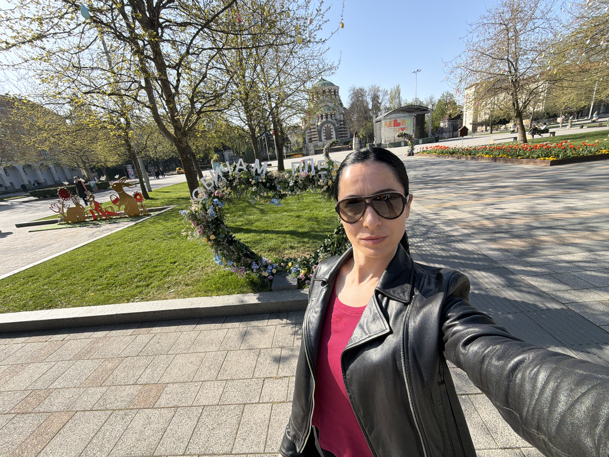 Woman takes morning selfies in Pleven public square