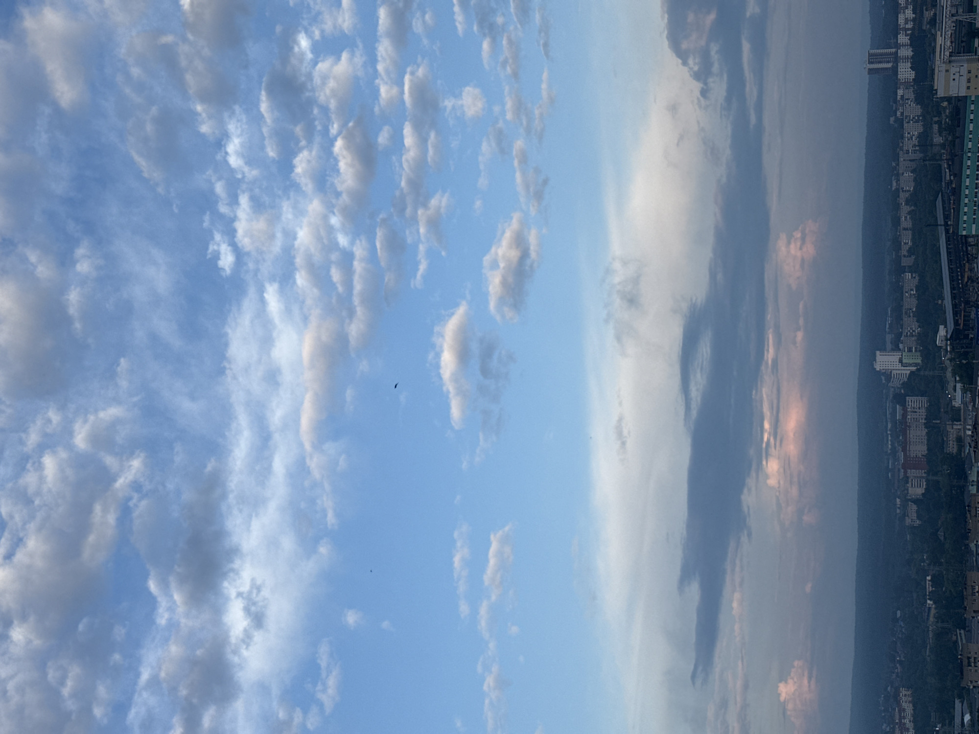 City skyline and cloud-watching from a high vantage point