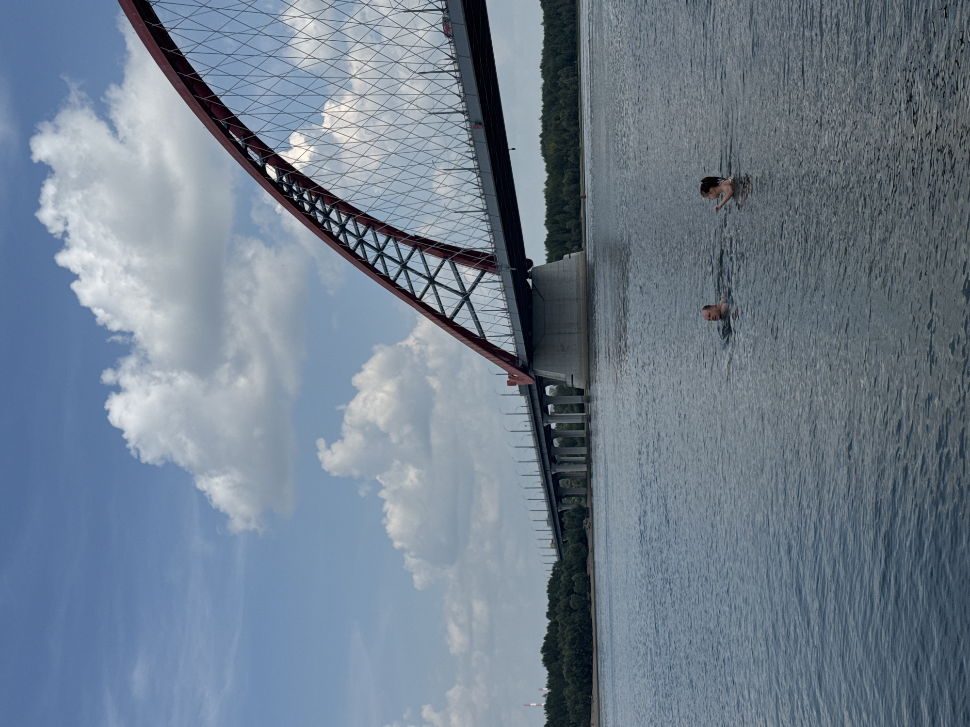 Summer day on the Ob River beach near Bugrinsky Bridge