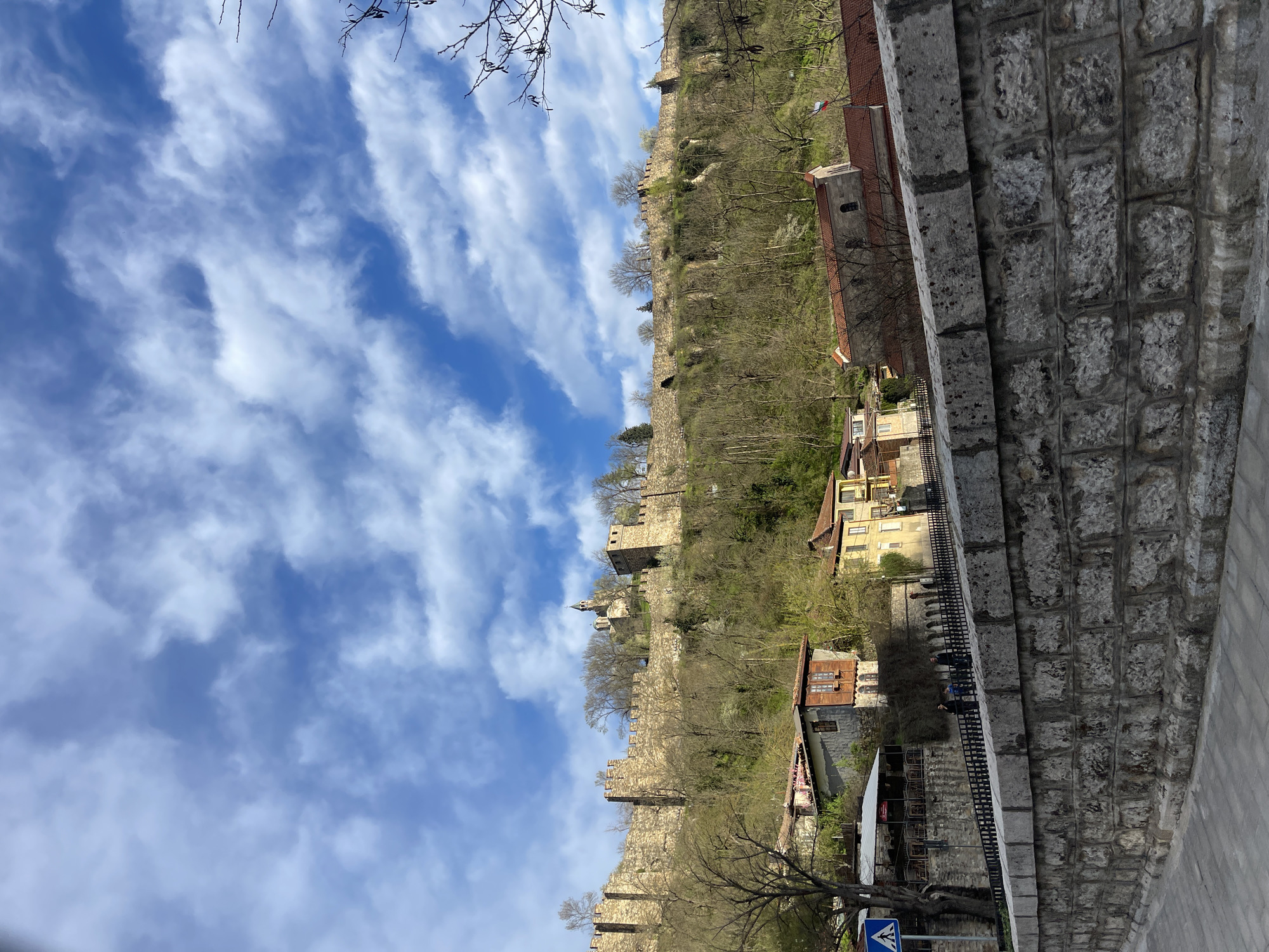 Tourist documents historic sites during drive through Veliko Tarnovo