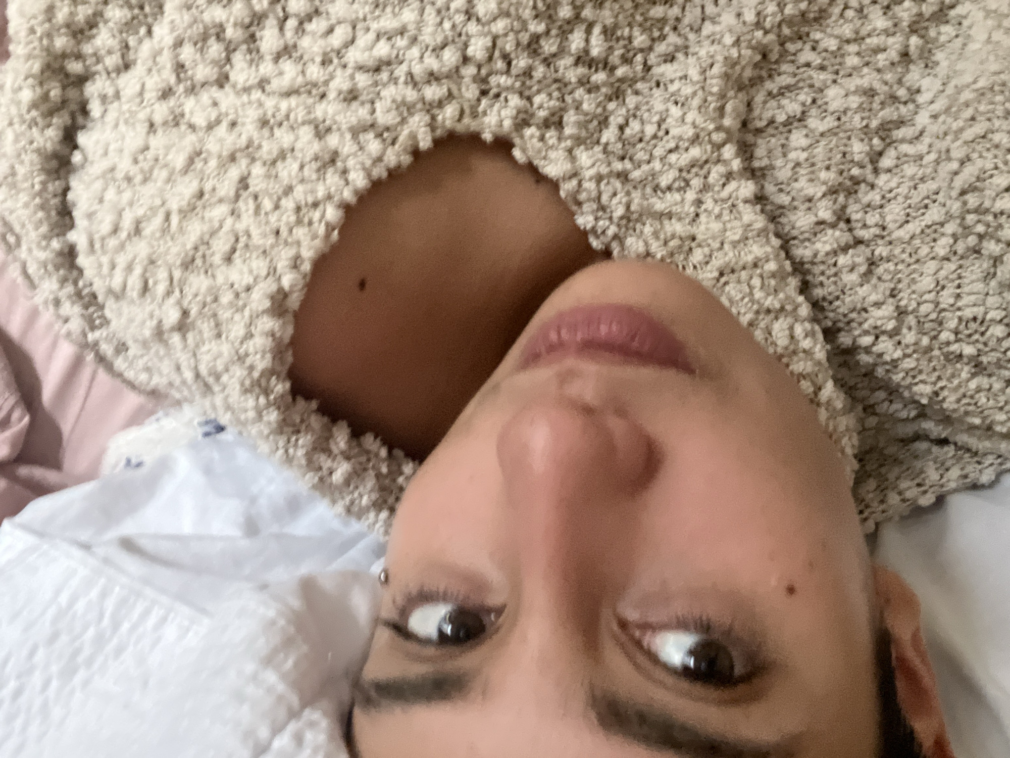 Personal moments captured in Buenos Aires: selfie, cat on bed