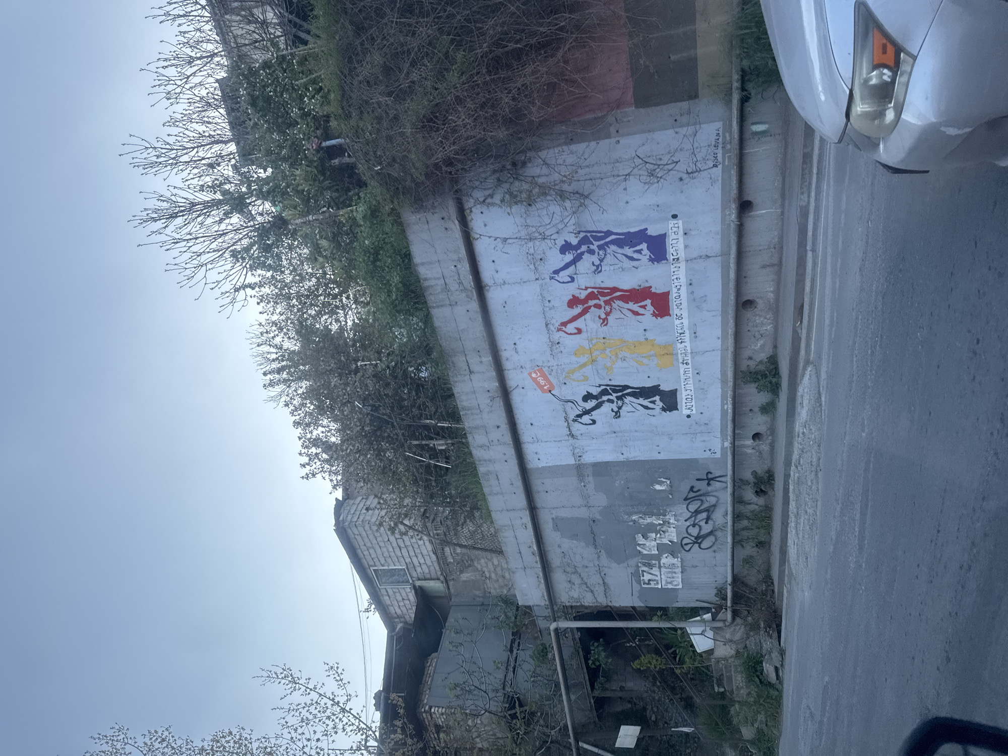 Tbilisi street scenes captured during afternoon traffic and construction