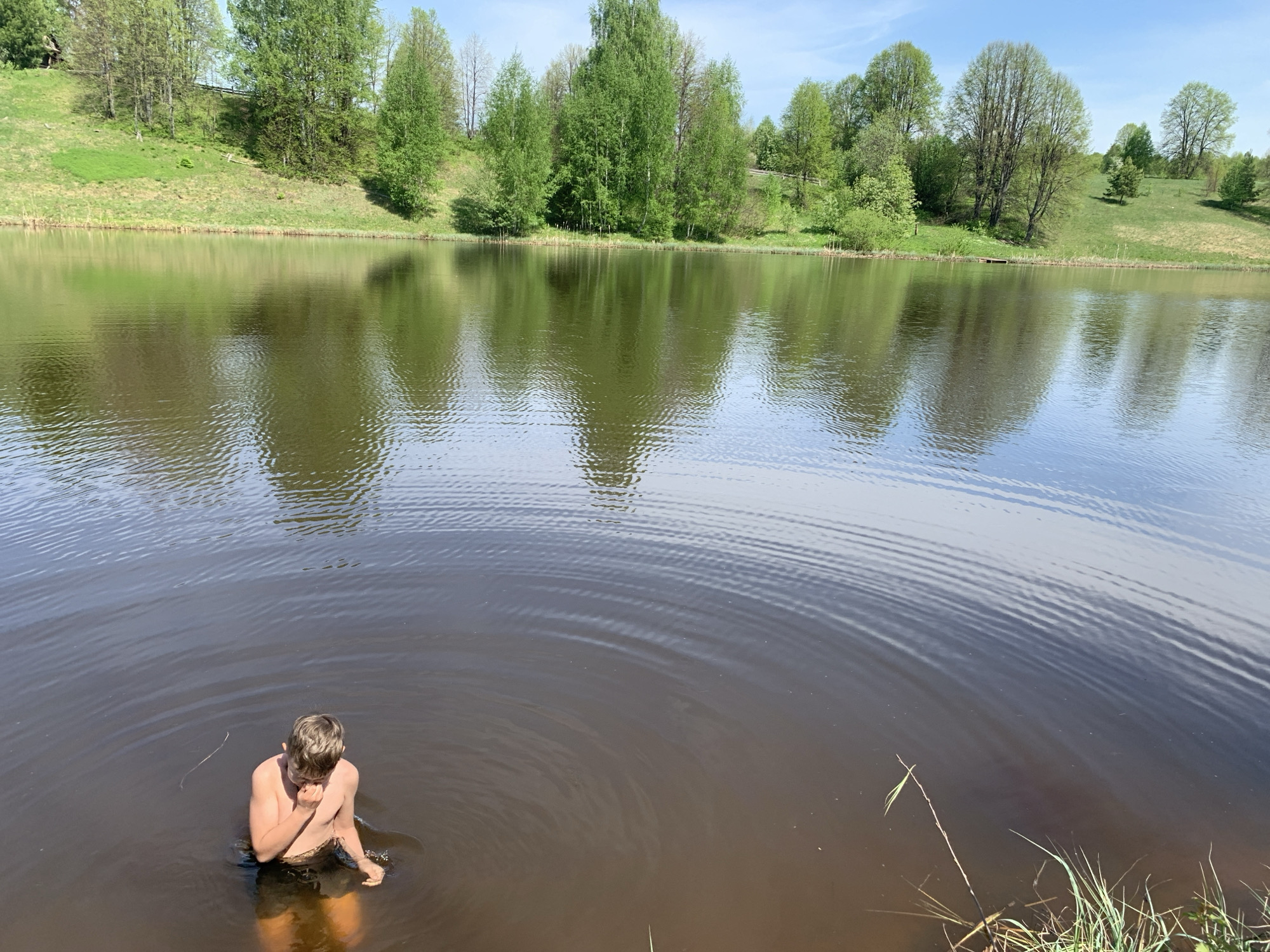 Family enjoys morning water activities in Zasechnyi, Russia