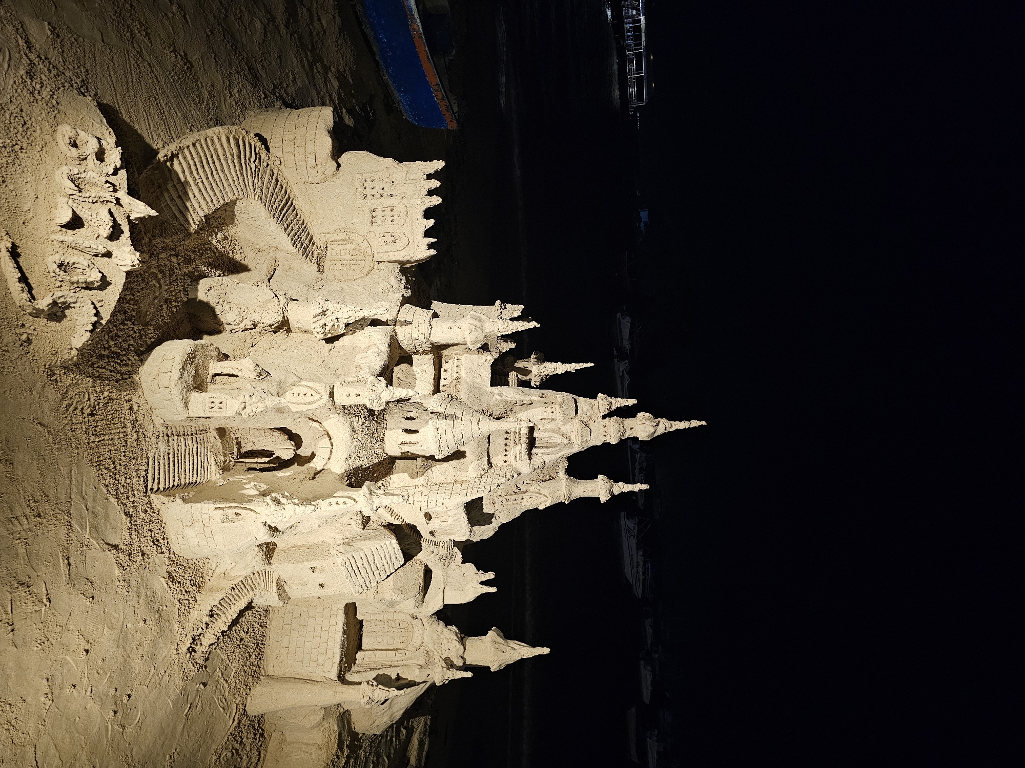Night scenes in Armação Dos Búzios feature sandcastle, music performance