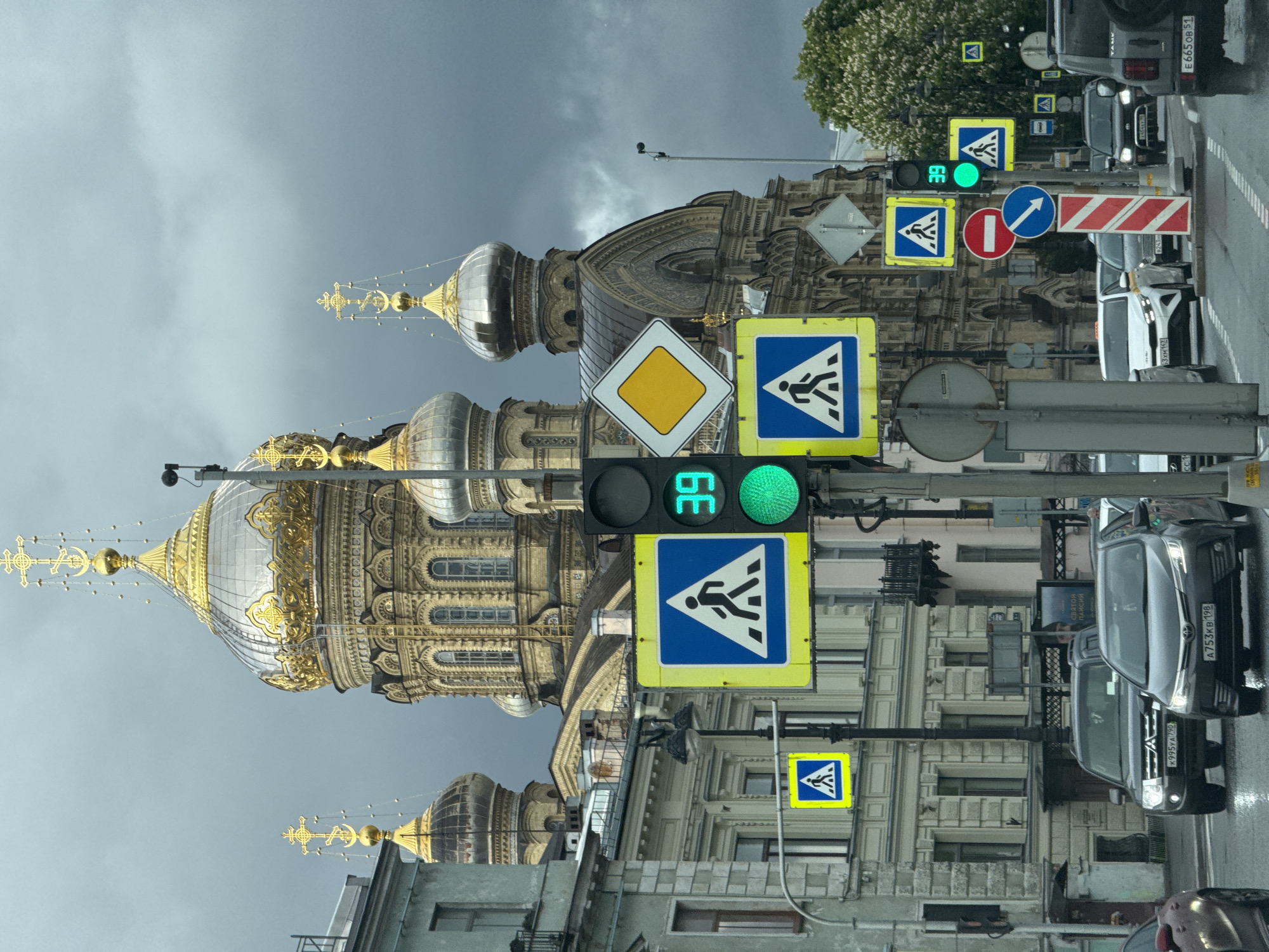Orthodox cathedral with gilded domes observed in Saint Petersburg