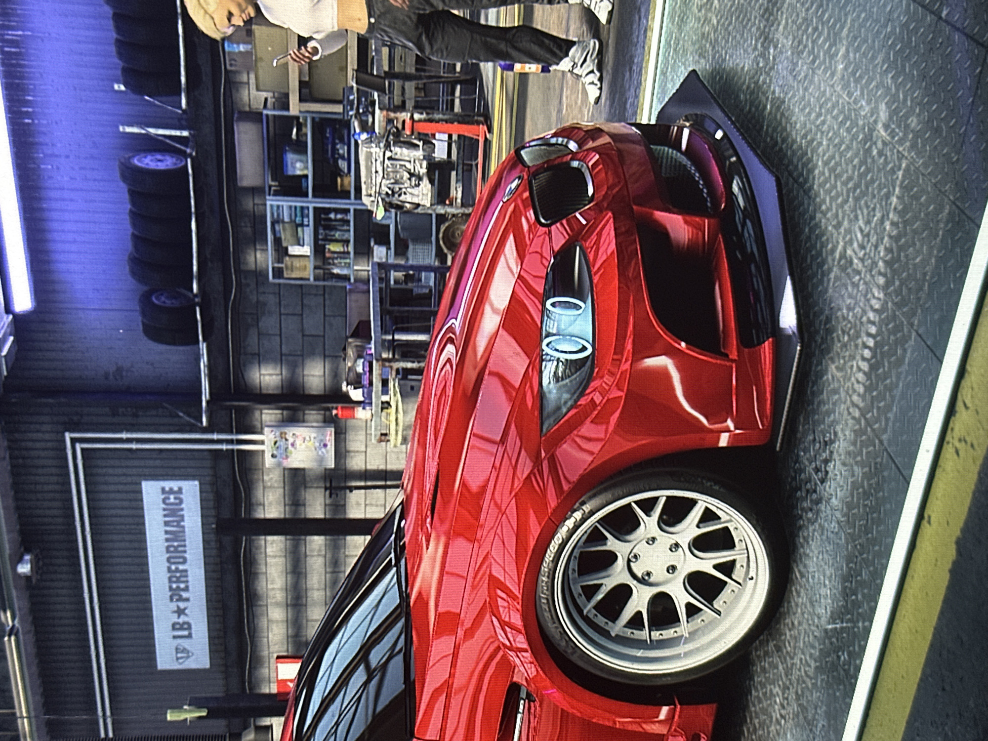 Modified red car spotted at performance shop in Bulgaria