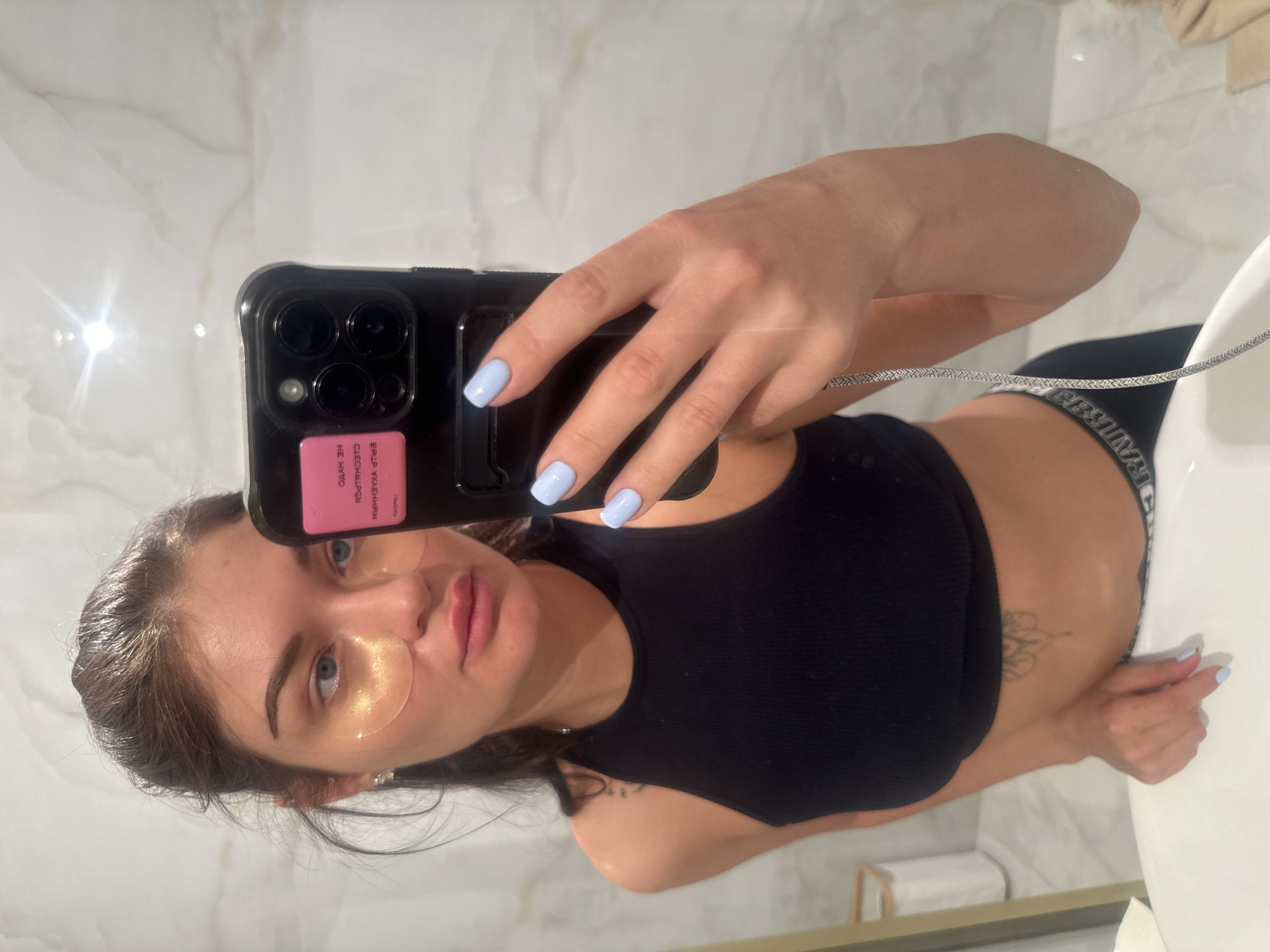 Woman Takes Selfie in Moscow Bathroom While Wearing Beauty Patches