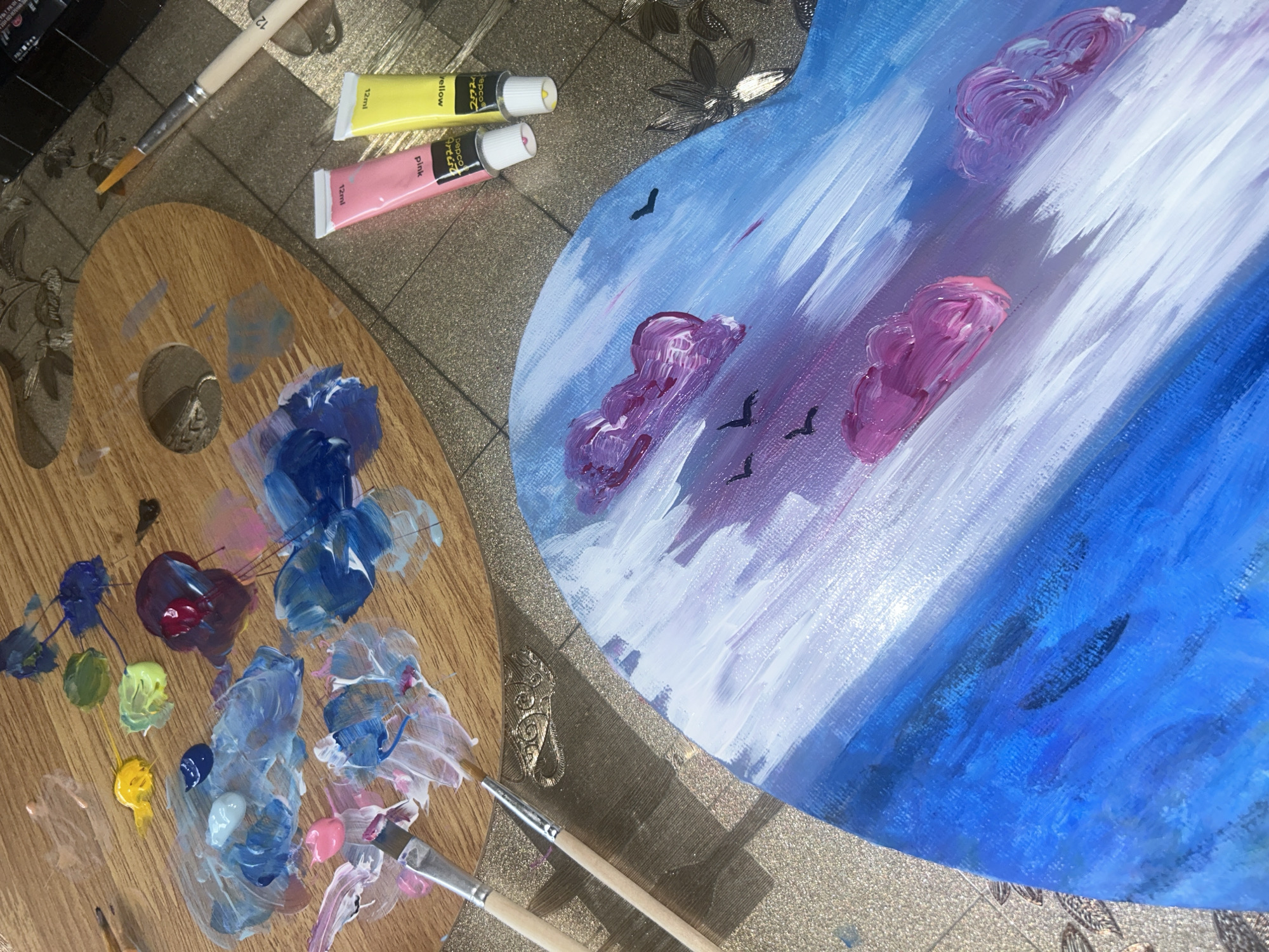 Artist's workspace with palette and unfinished painting documented Bulgaria