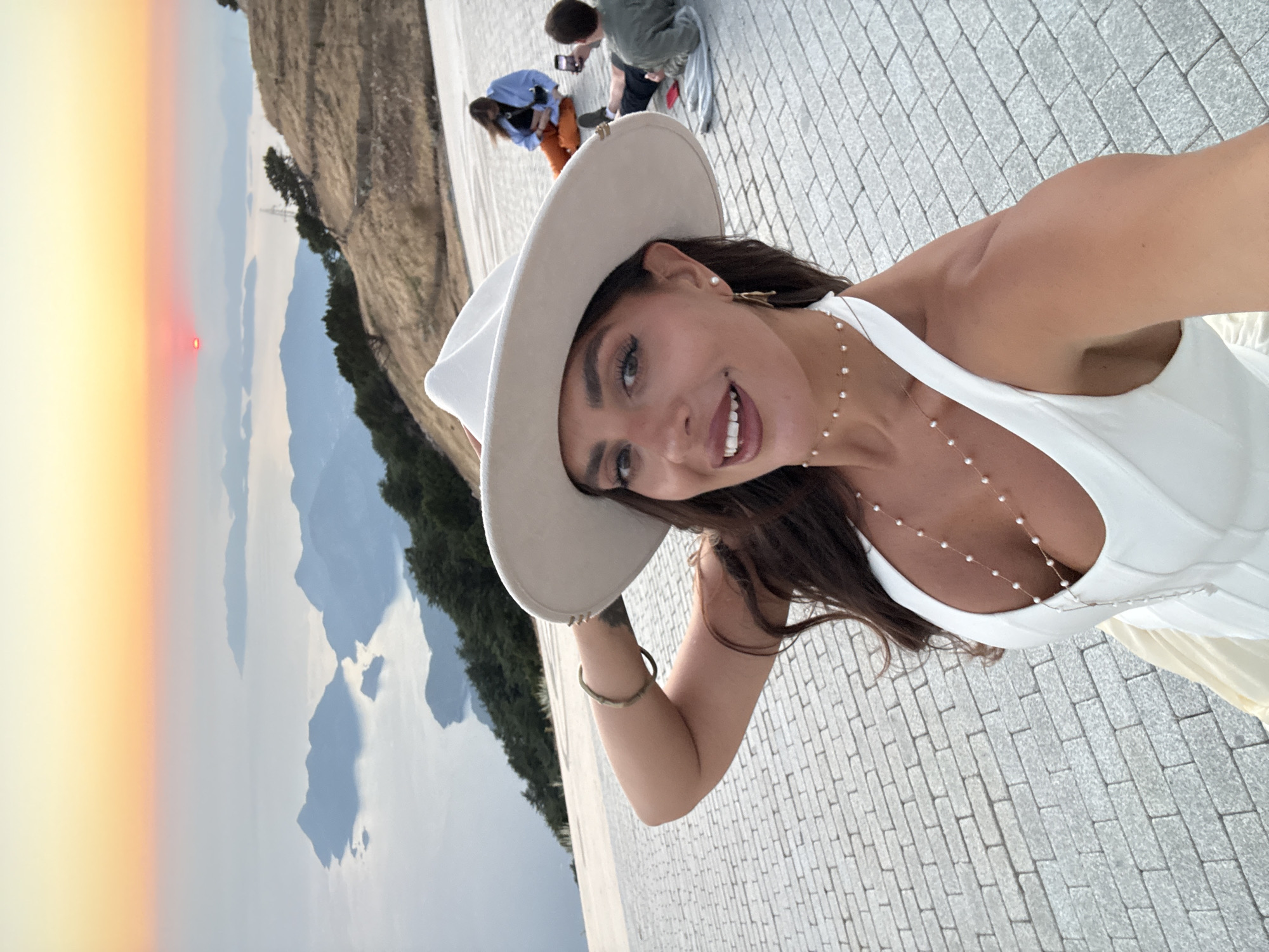 Sunset dining and selfies at a Fethiye overlook restaurant