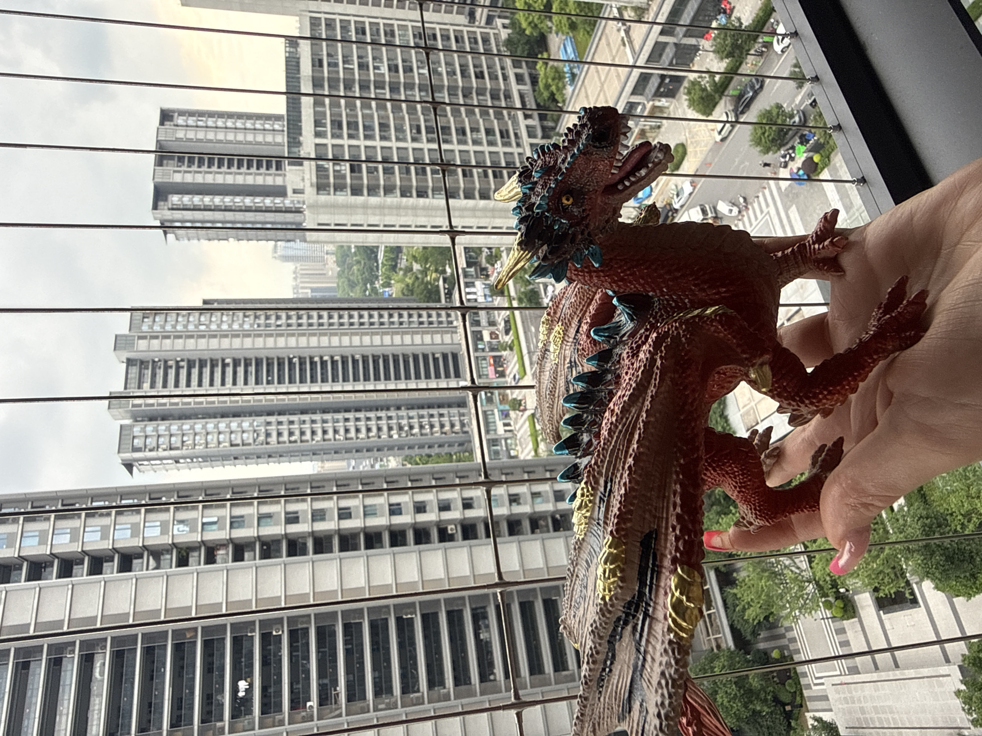 Collectible toys shown off against Yiwu's high-rise skyline