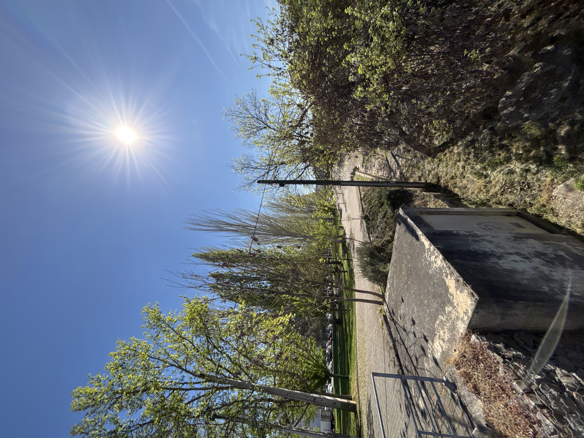 Afternoon stroll documented through sunny Mirandela, Portugal streets and riverfront