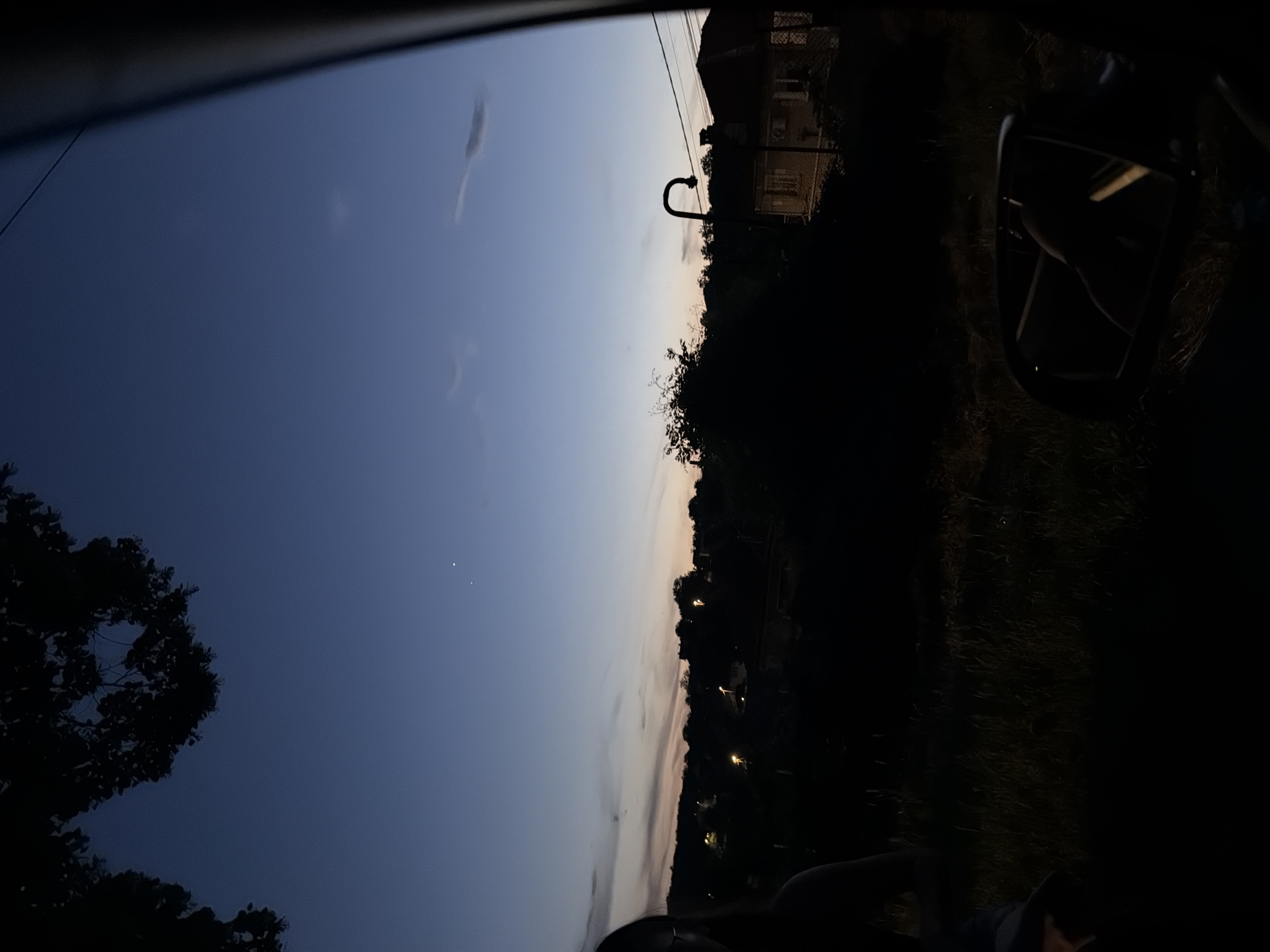 Evening car journey documented in rural Bulgarian village