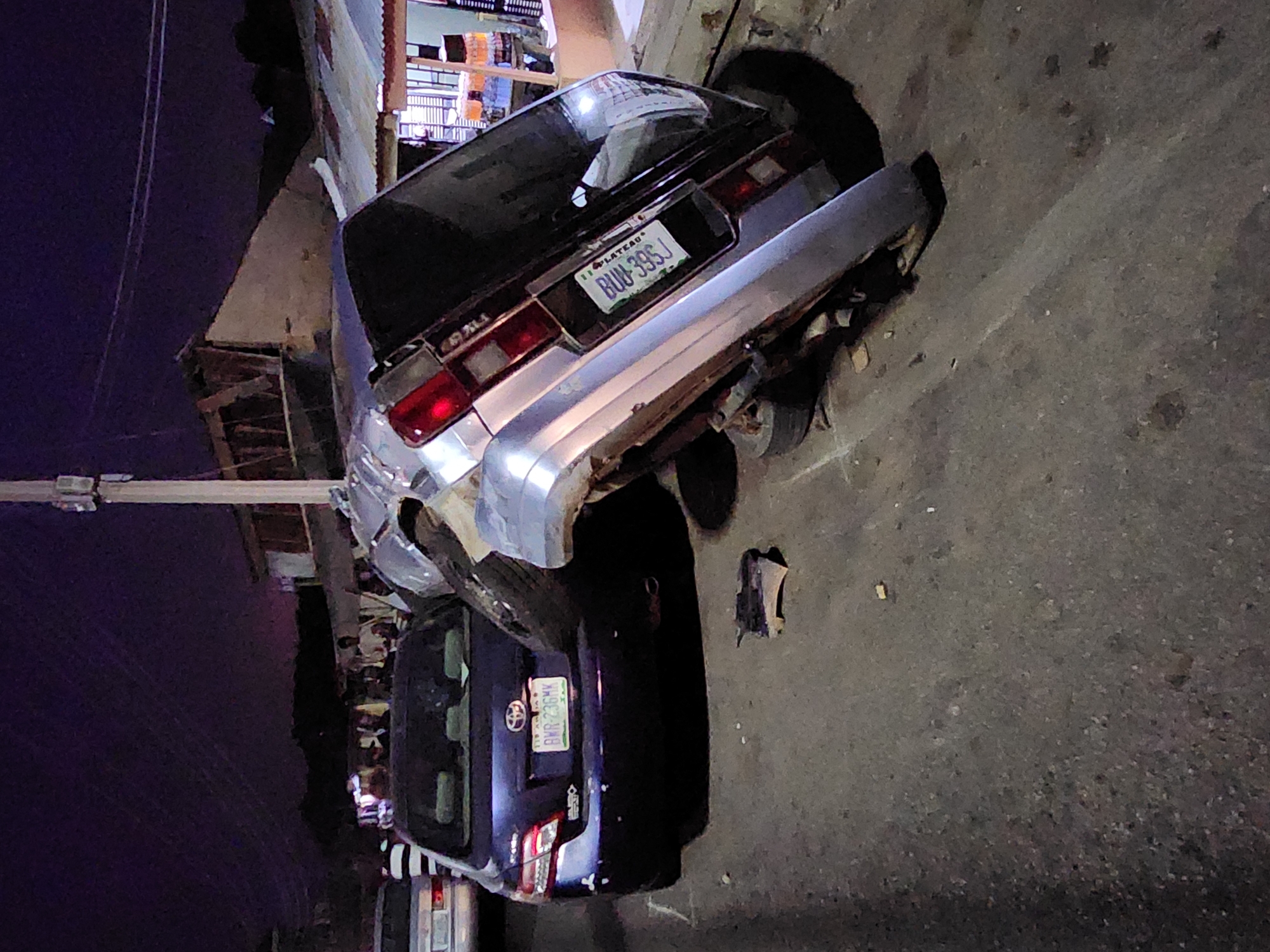 Multi-vehicle accident leaves cars damaged, overturned on city street