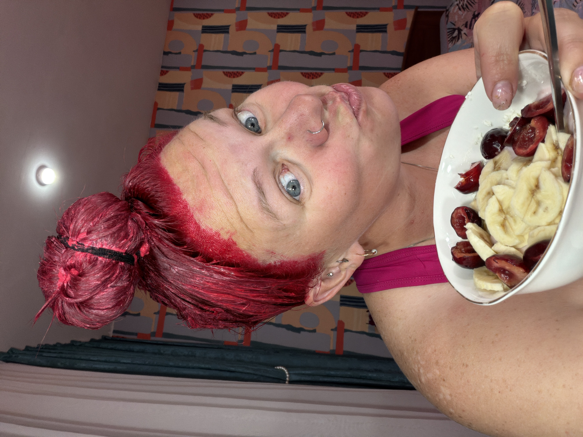 Person with fresh red hair dye photographed by witnesses
