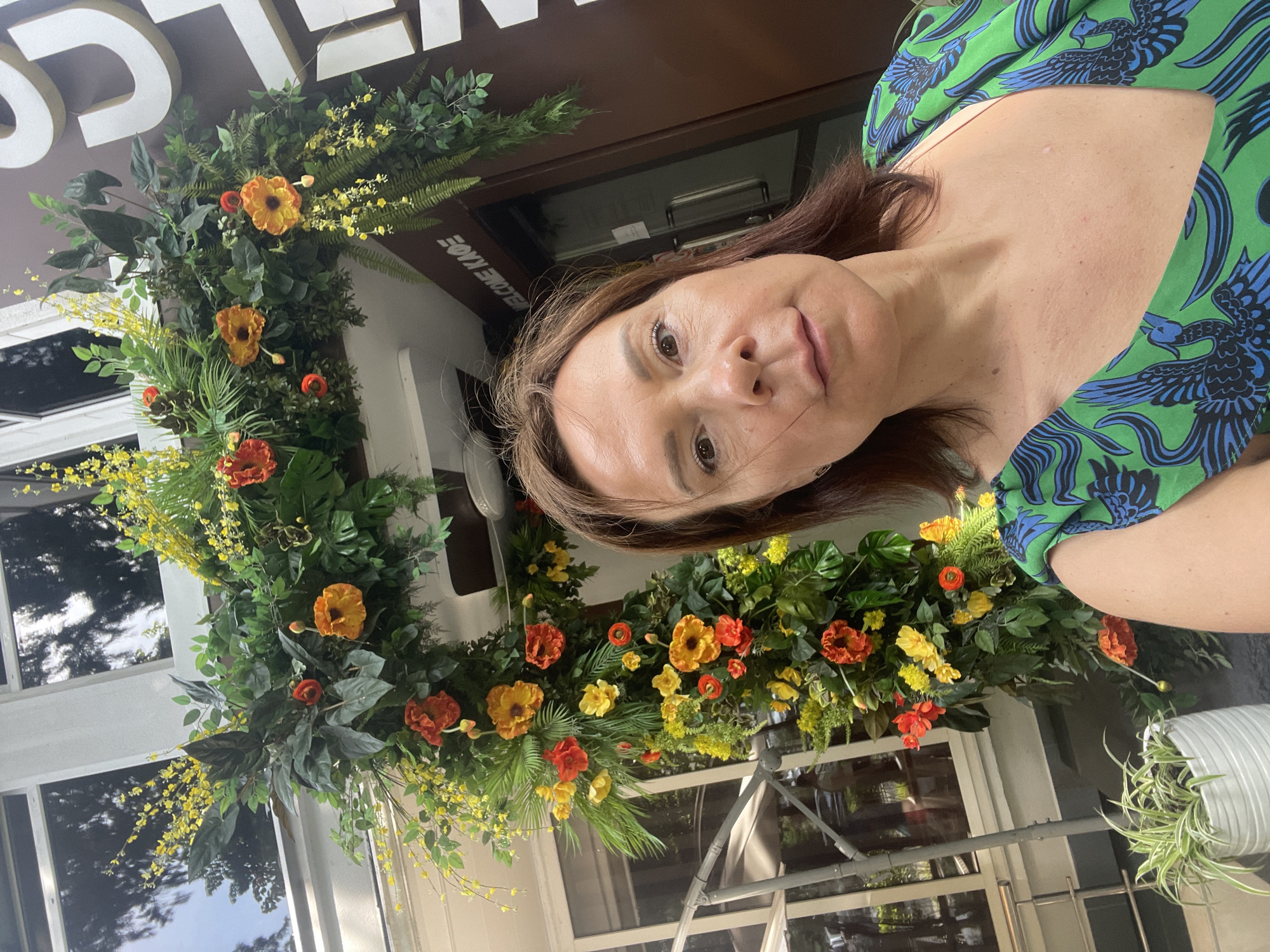 Woman enjoys afternoon tea and flowers in Sochi