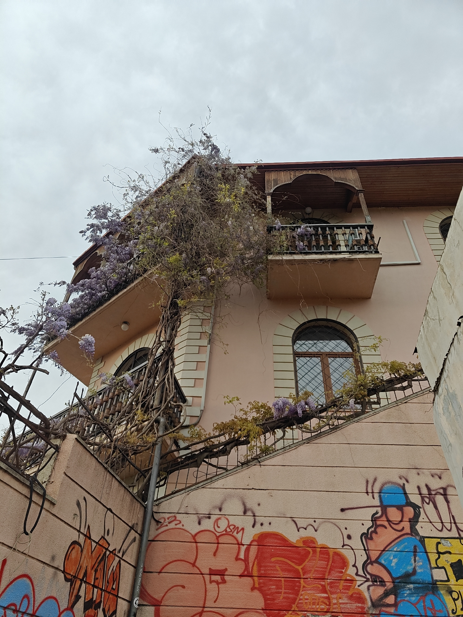 Photographer documents Tbilisi cityscape under cloudy skies