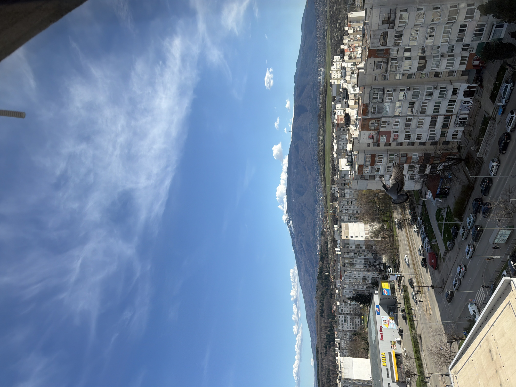 Aerial view captures Sofia's apartment districts under clear skies