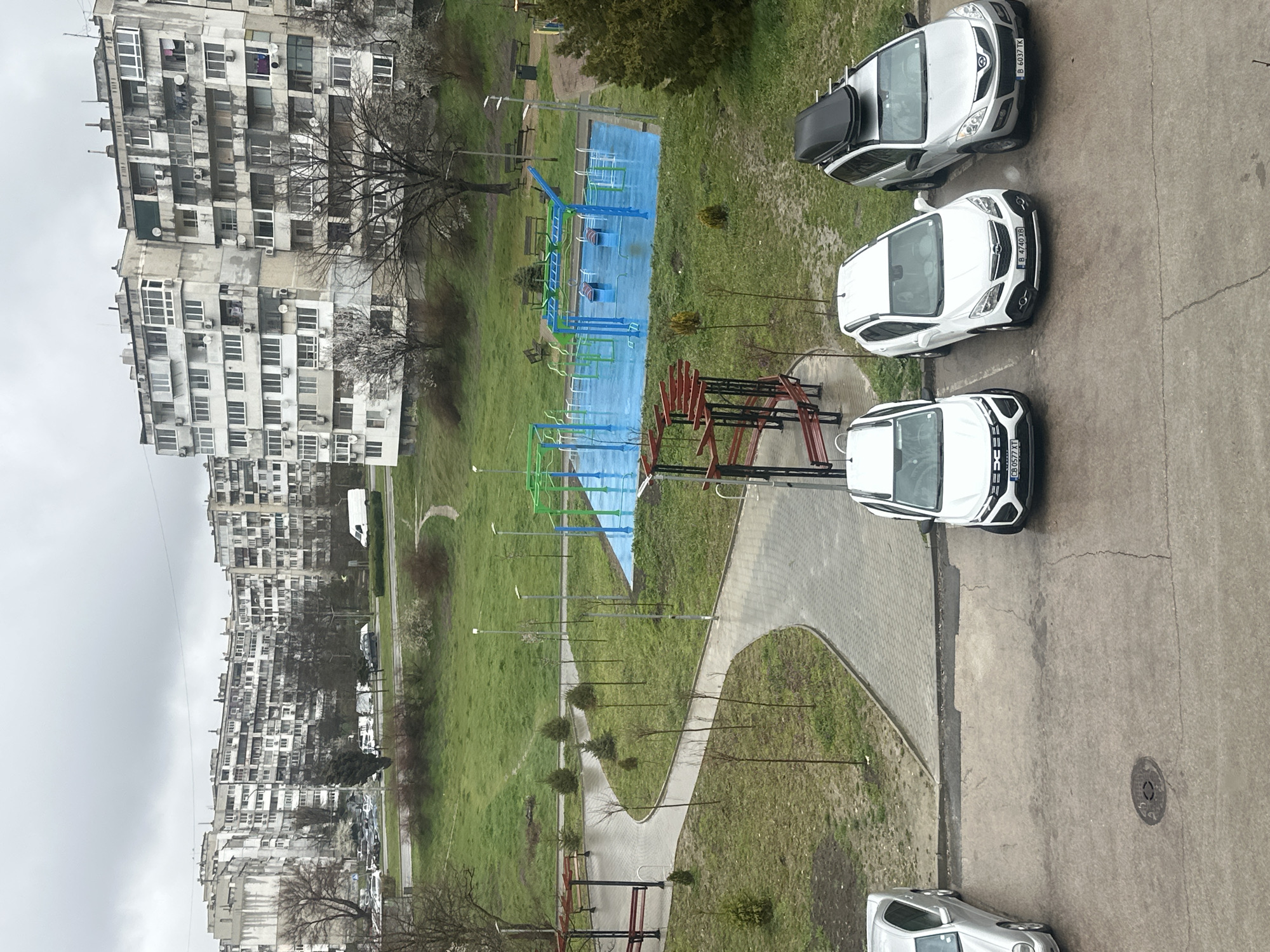 Aerial view shows Soviet-era apartments and playground in Varna