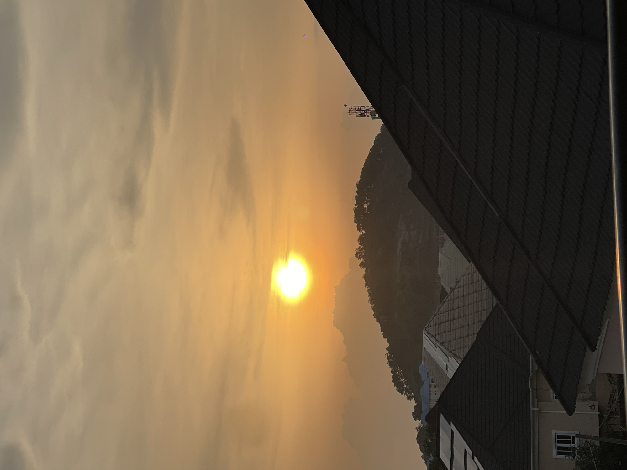 Abuja sunset from multiple angles, rooftops and open sky