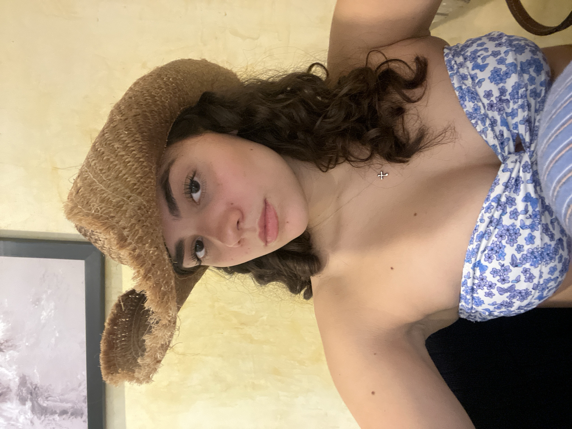 Woman in summer attire reflected in mirror, Brisas de Zicatela