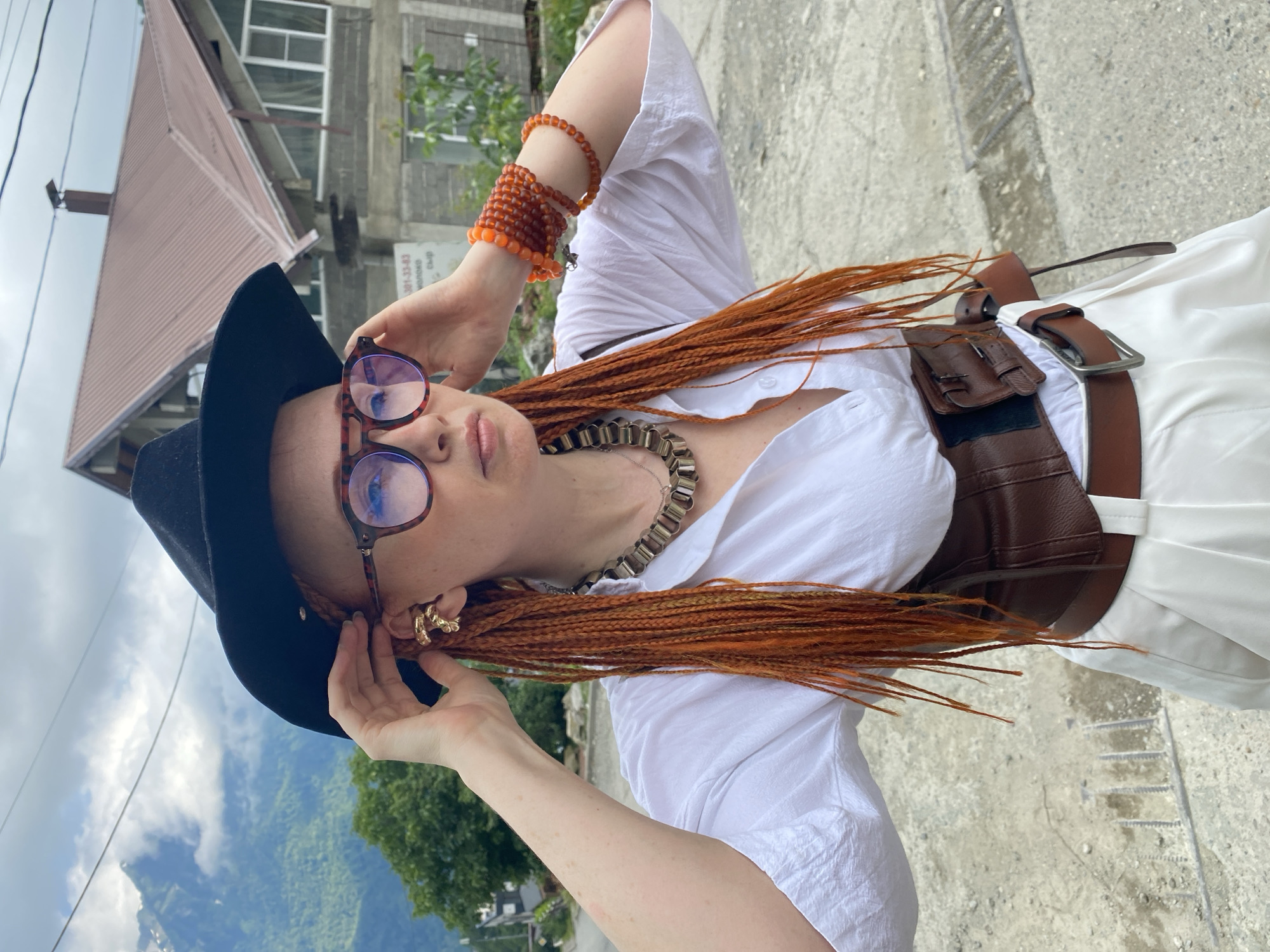 Bold fashion shoot on a sloped road in Krasnaya Polyana