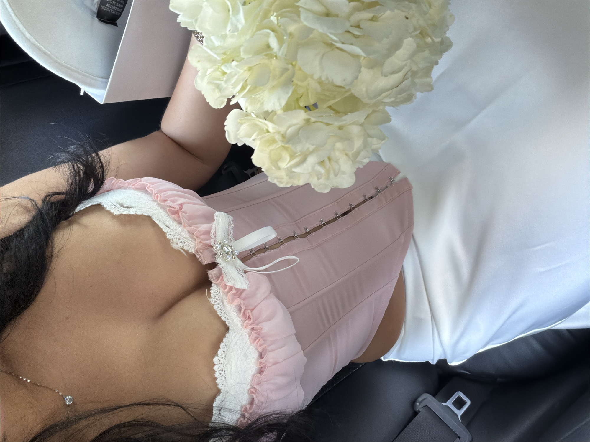 Person in corset garment observed in vehicle in Moscow