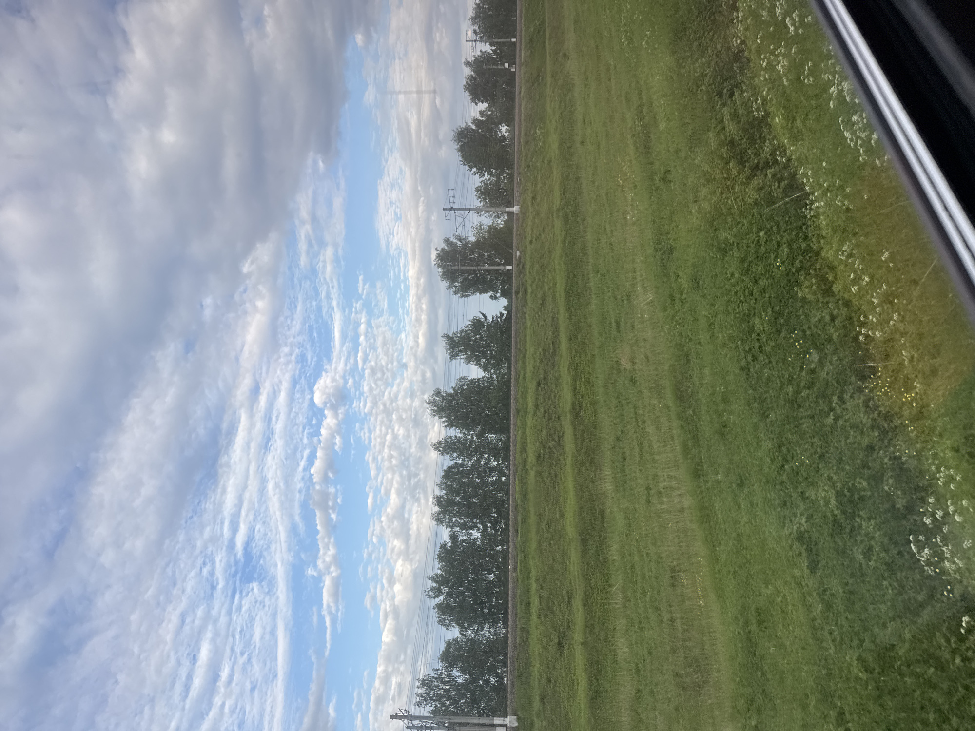 Train passenger documents rural journey through Krasnoborskoye, Russia