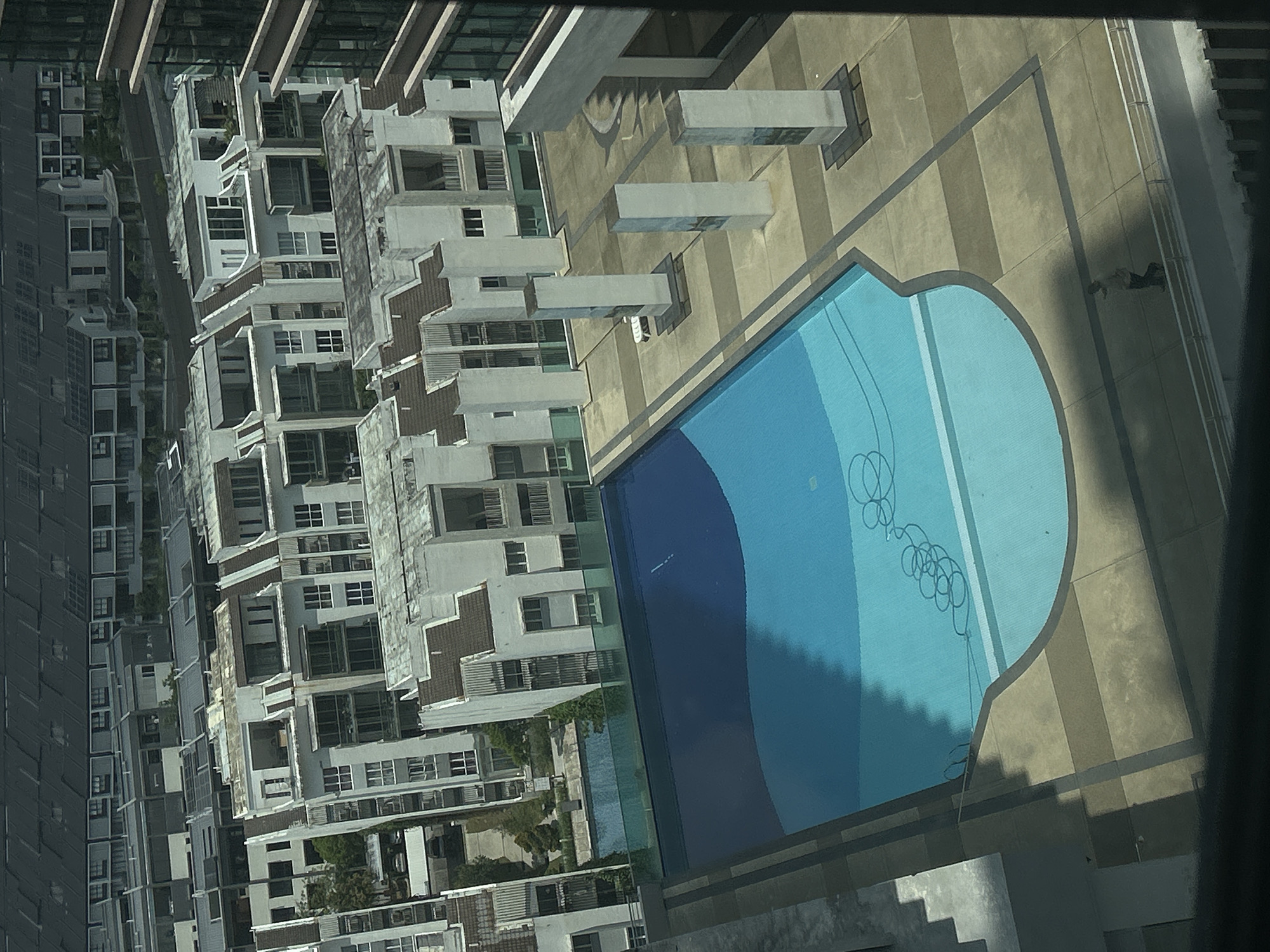 Aerial view captures residential pool complex in Kuala Lumpur