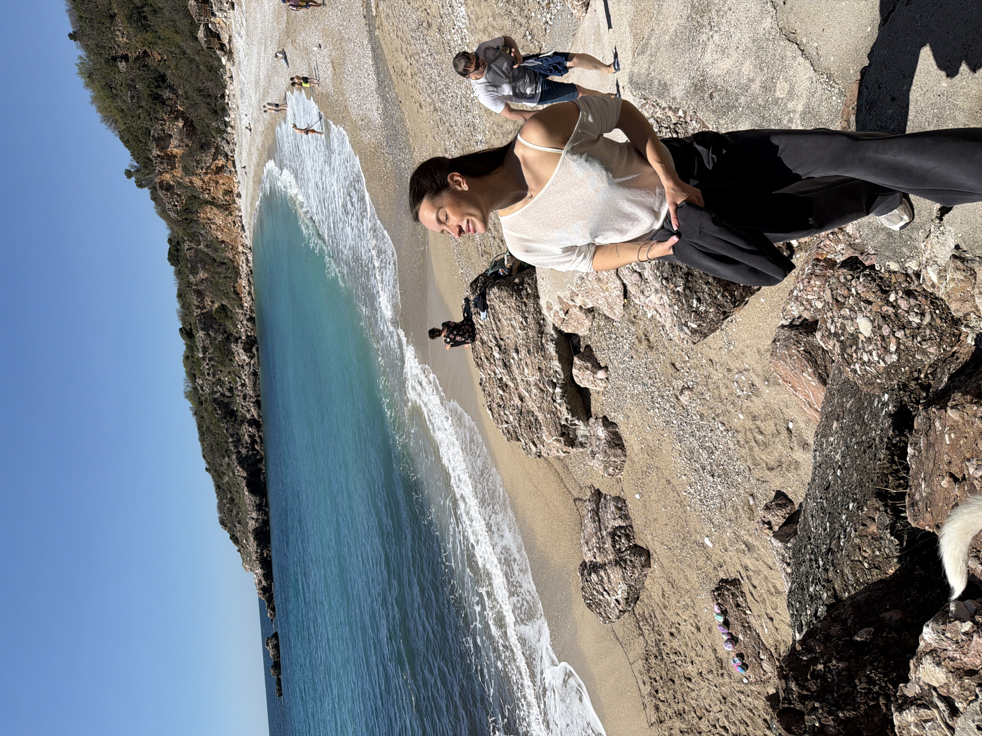 Beach visitors enjoy sunny morning at Drobnići, Montenegro coast