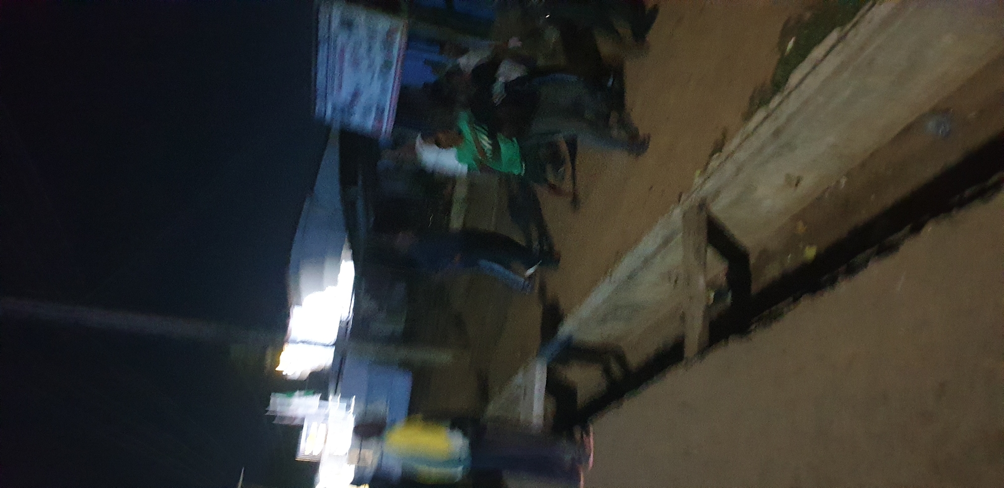 Nighttime street life captured in Sabon Tasha commercial district