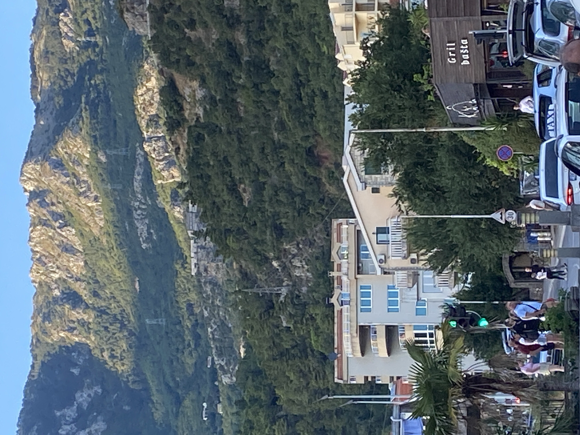 Stormy summer skies over Budva's stone streets and rooftops