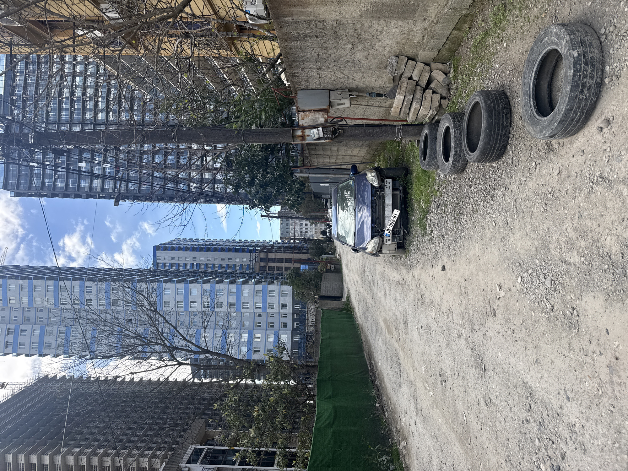 Woman, luxury car, kindergarten captured in central Batumi moments