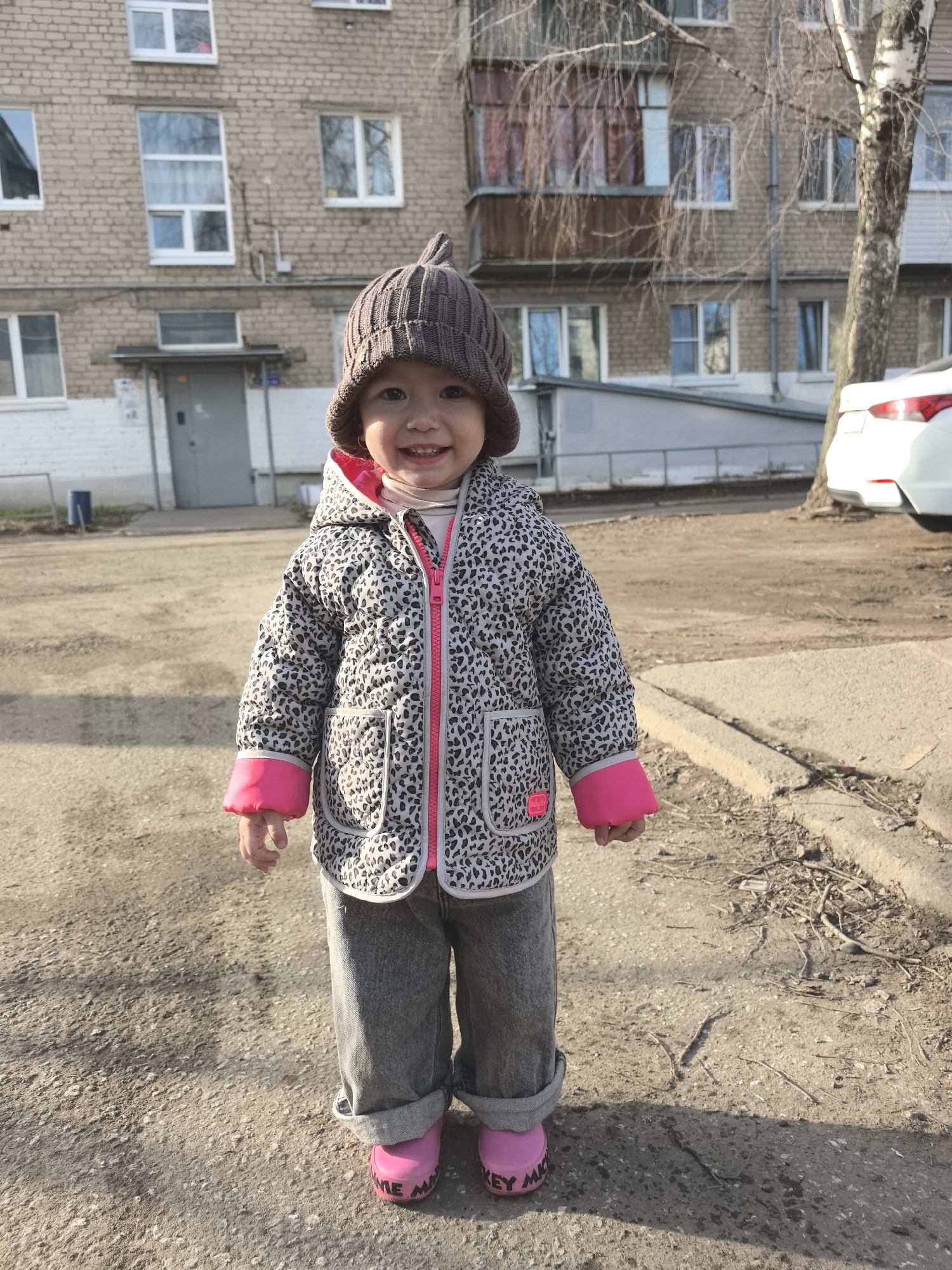Child plays on residential street in Chaikovsky, Russia