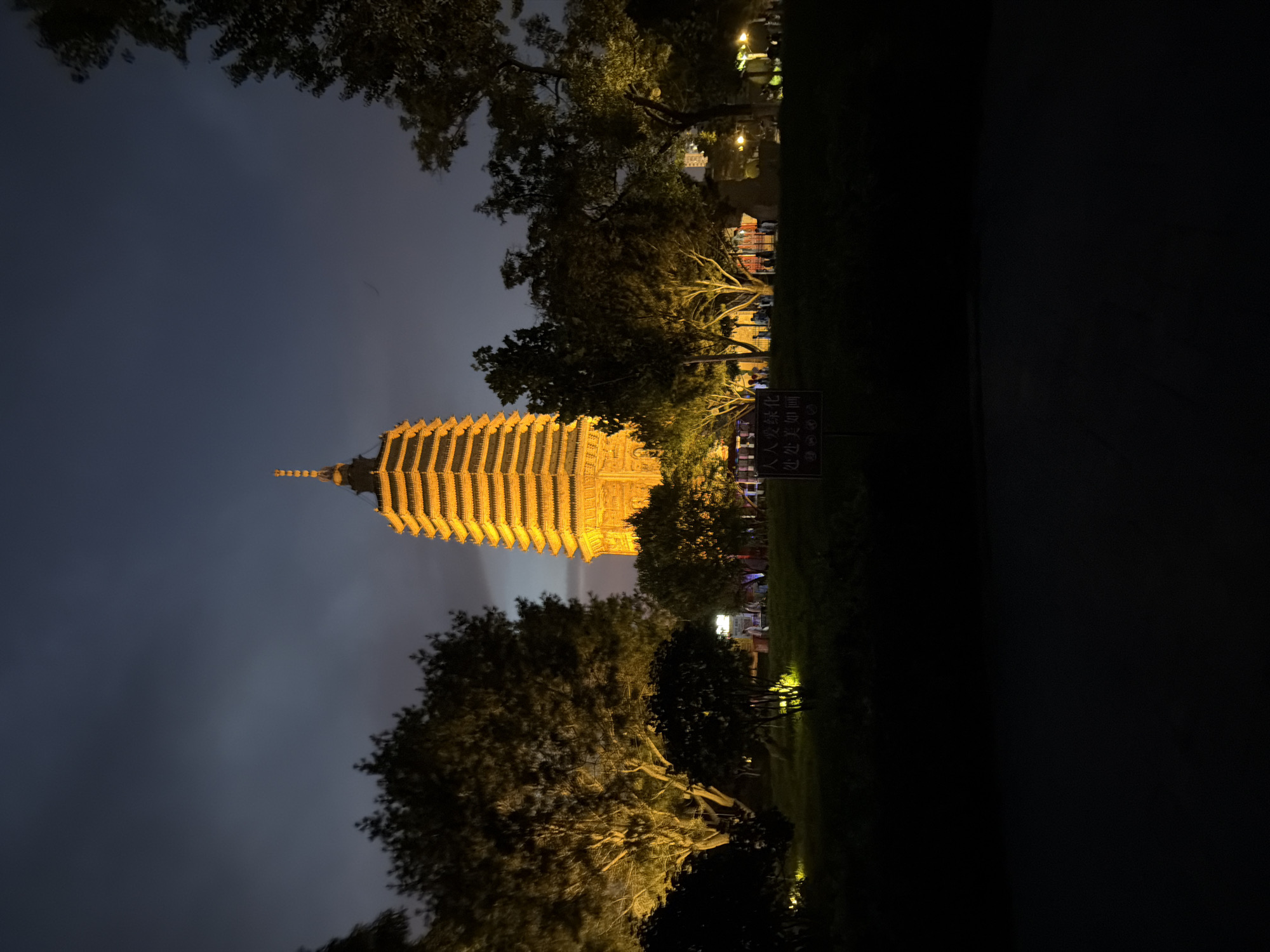 Jinzhou after dark: landmarks, traffic, and plaza dancing